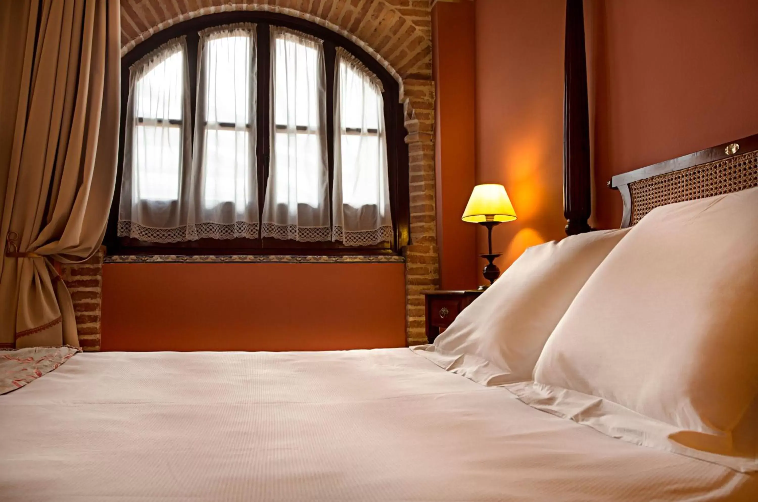 Bed in Hotel Alcázar de la Reina