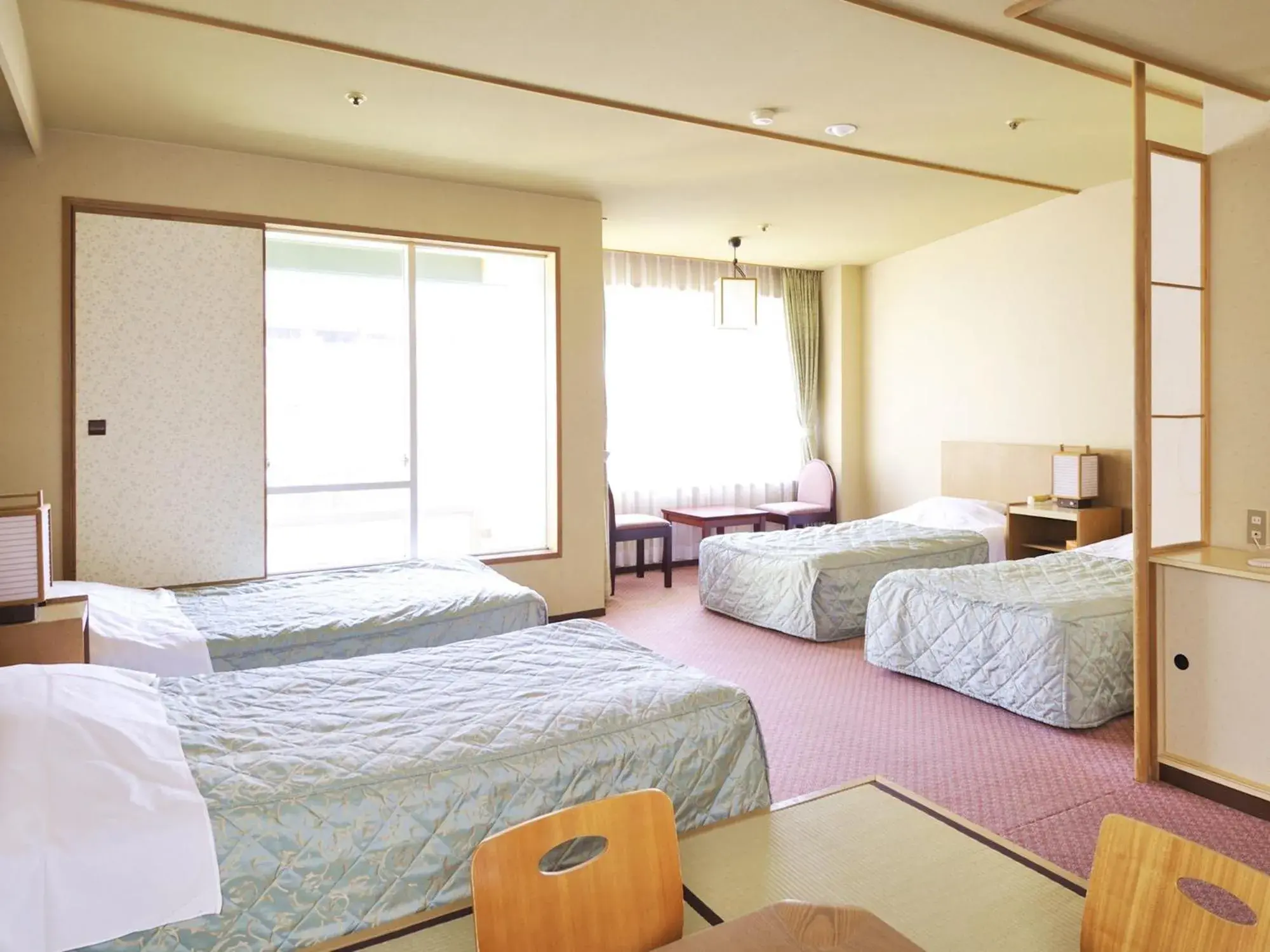 Living room, Bed in Hotel Shikanoyu