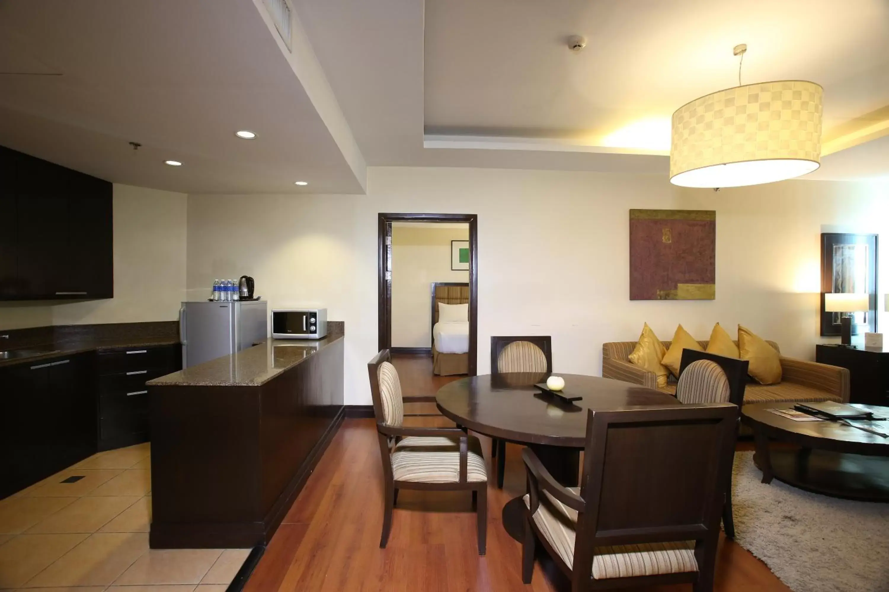 Kitchen or kitchenette, Seating Area in Crown Regency Hotel & Towers