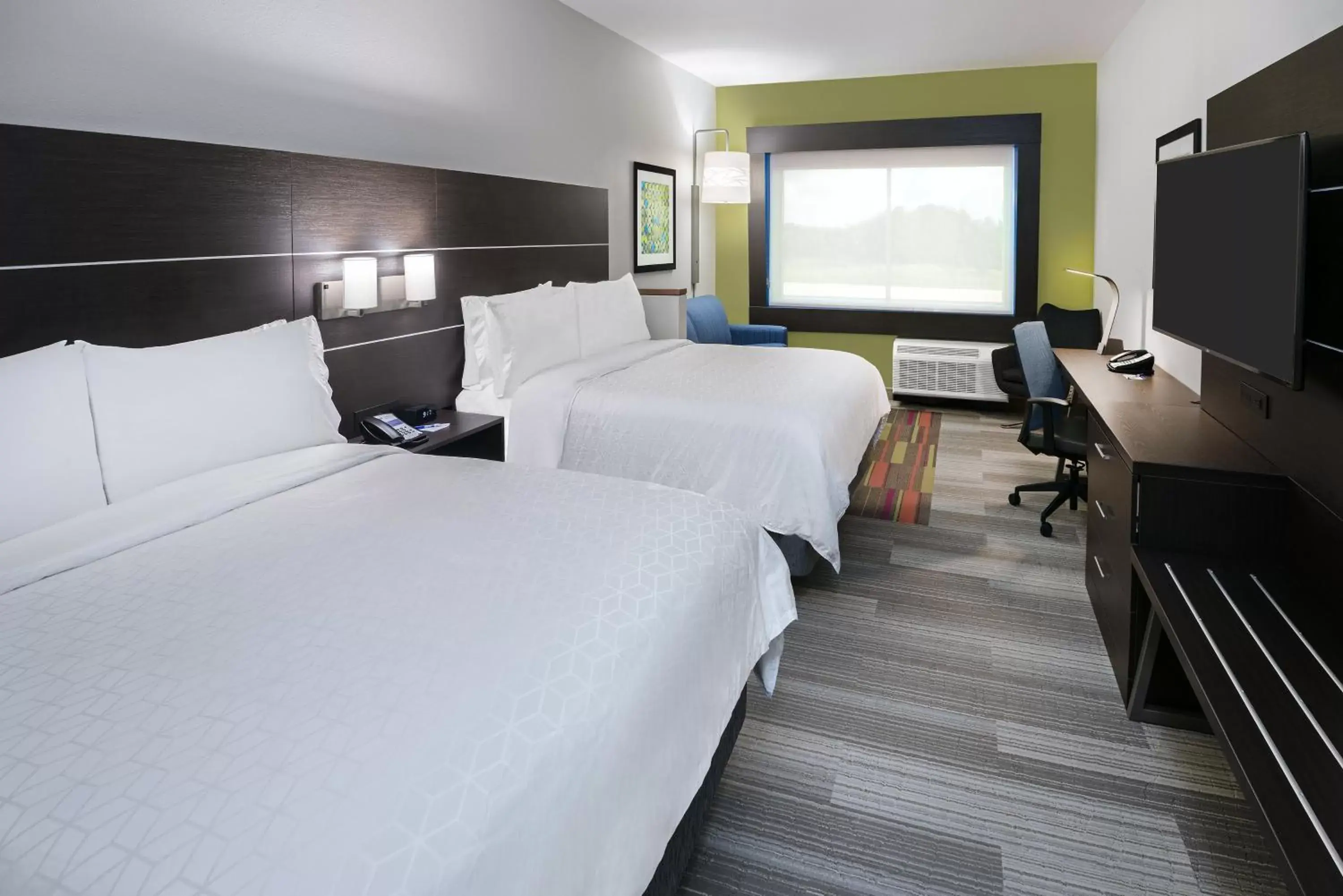Bedroom, Bed in Holiday Inn Express & Suites Bryan - College Station, an IHG Hotel