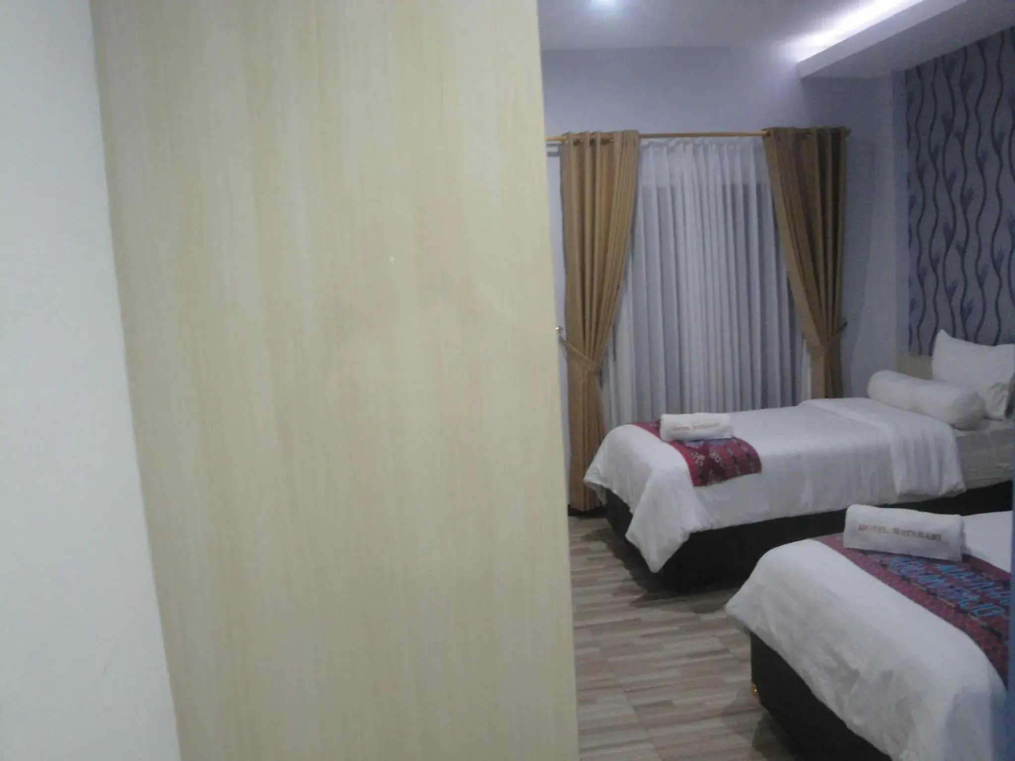 Bed in Matahari Hotel