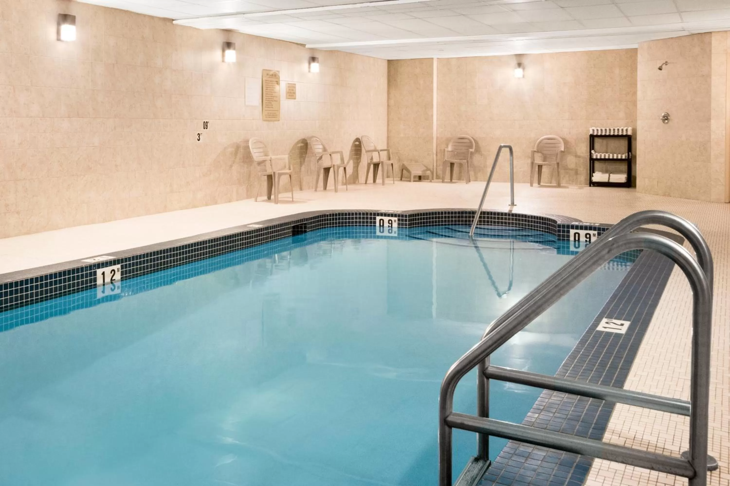 Swimming pool in Days Inn & Suites by Wyndham Cochrane