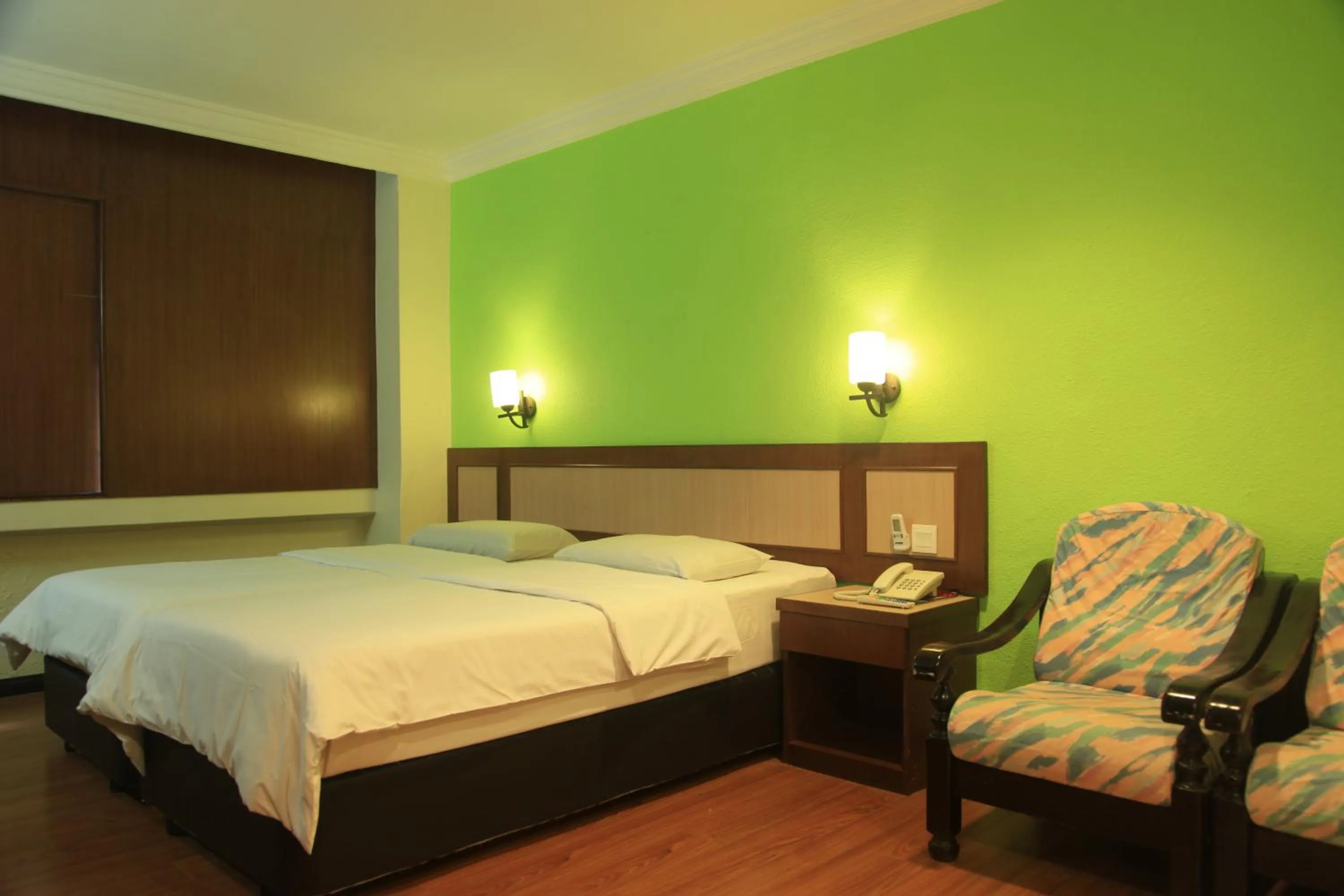 Bed in The Inn Hotel