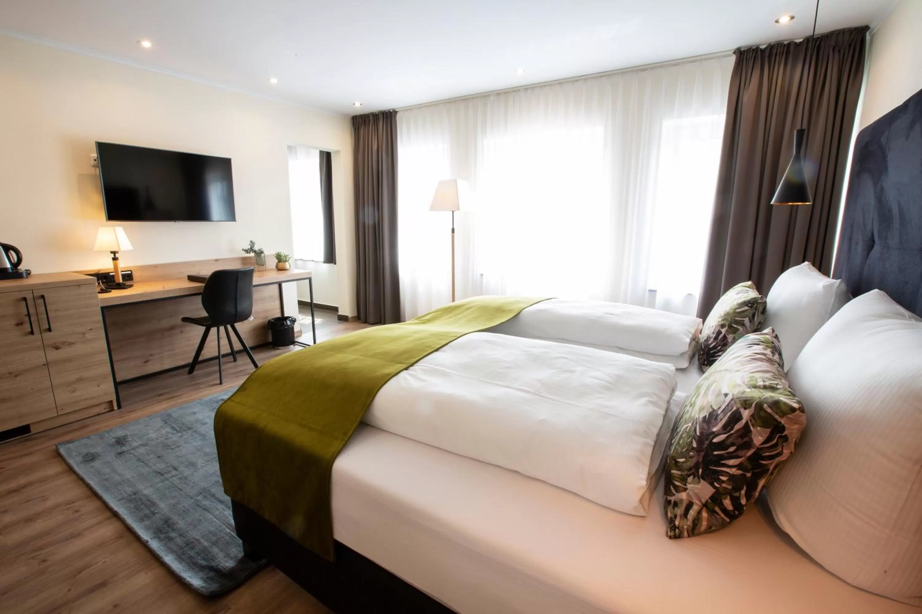 Bed in Stadthotel Lichtenfels