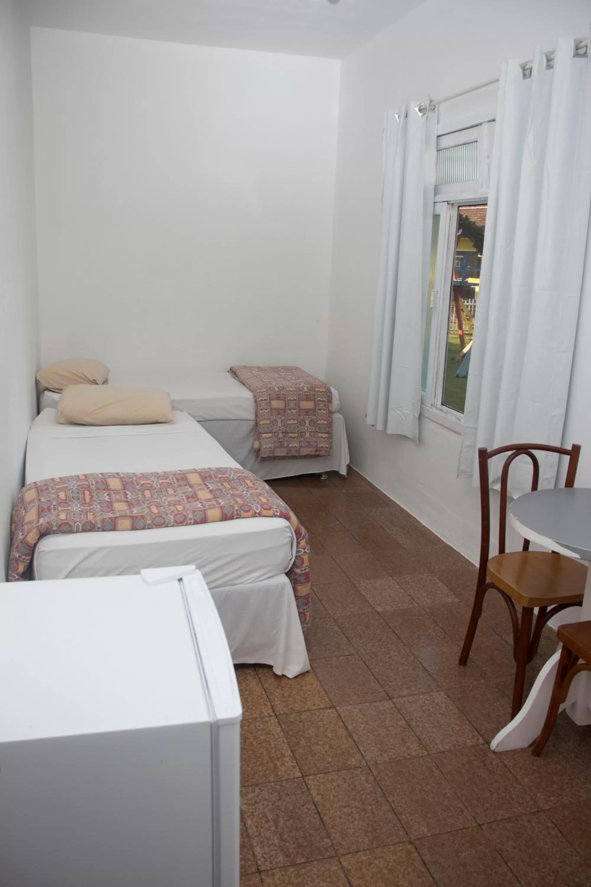 Bed in Pousada Marinamarela