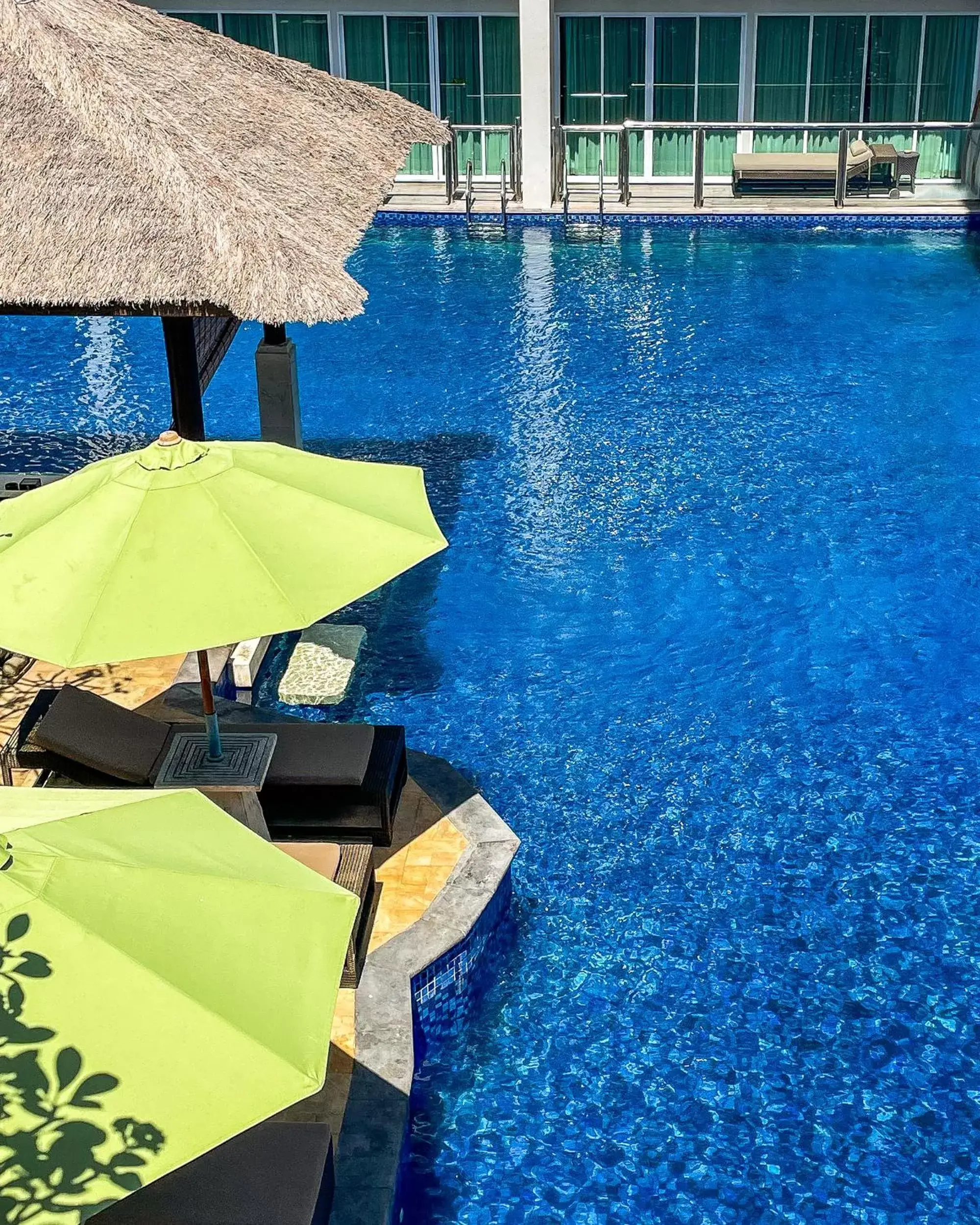 Balcony/Terrace, Swimming Pool in The Sakala Resort Bali All Suites CHSE Certified