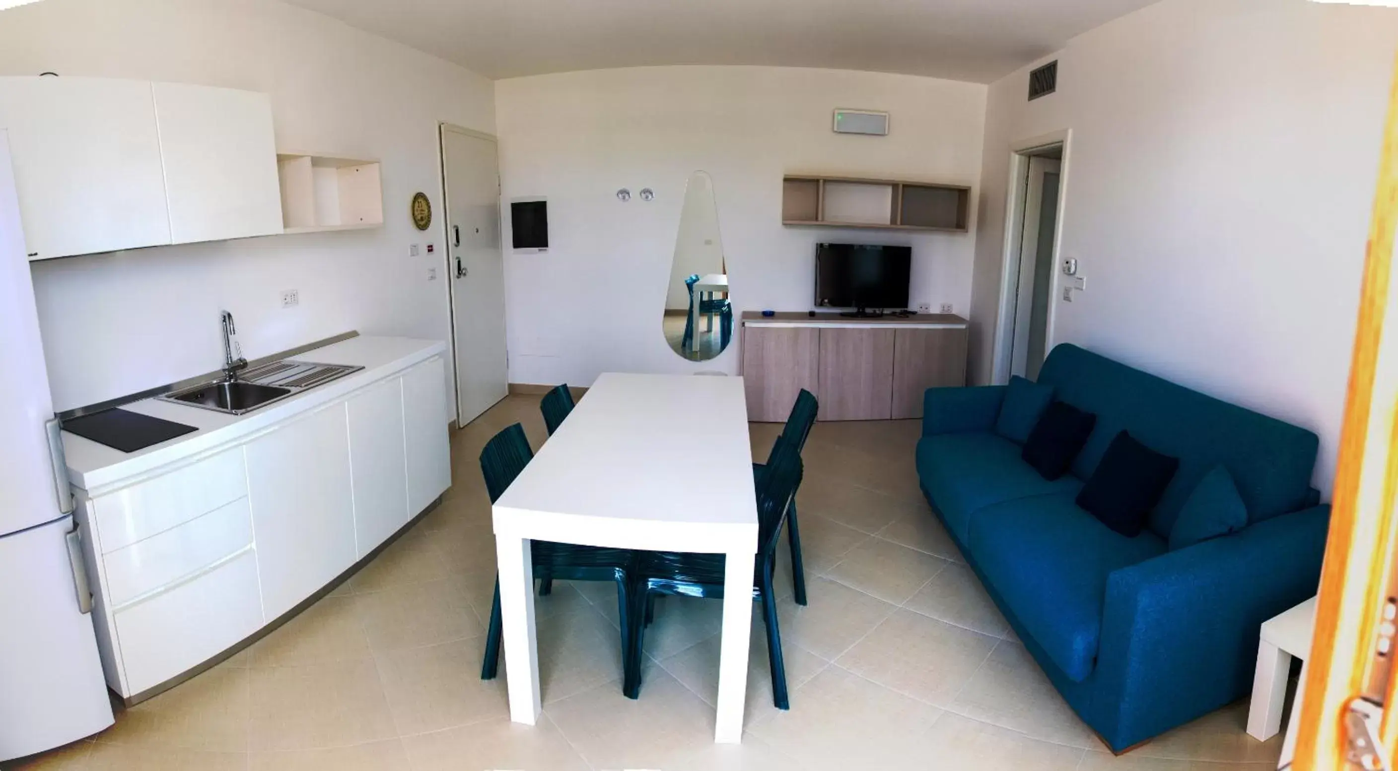 Living room, Kitchen/Kitchenette in La Corte di Leuca Residence & SPA