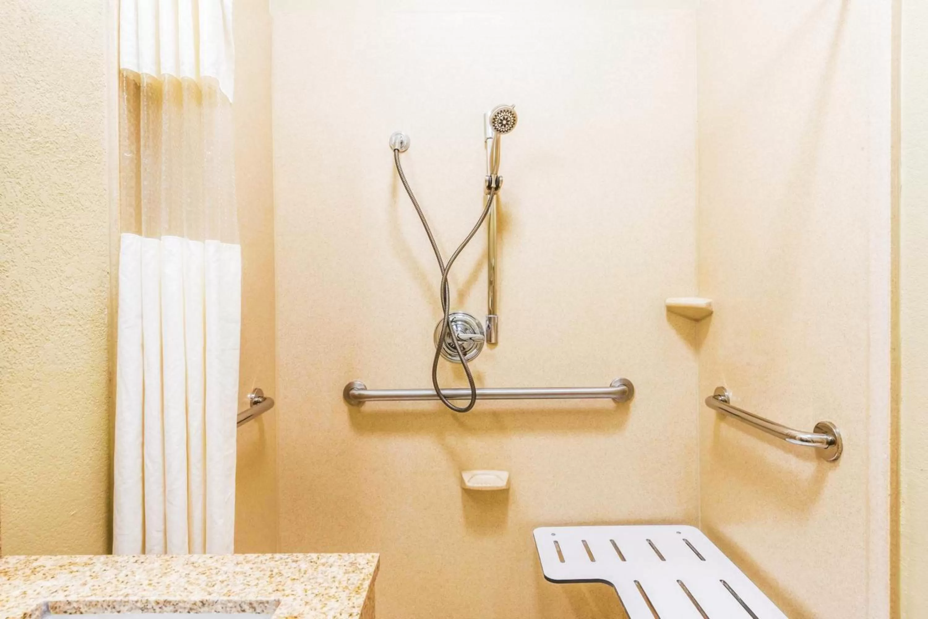 Bathroom in Days Inn & Suites by Wyndham Mineral Wells