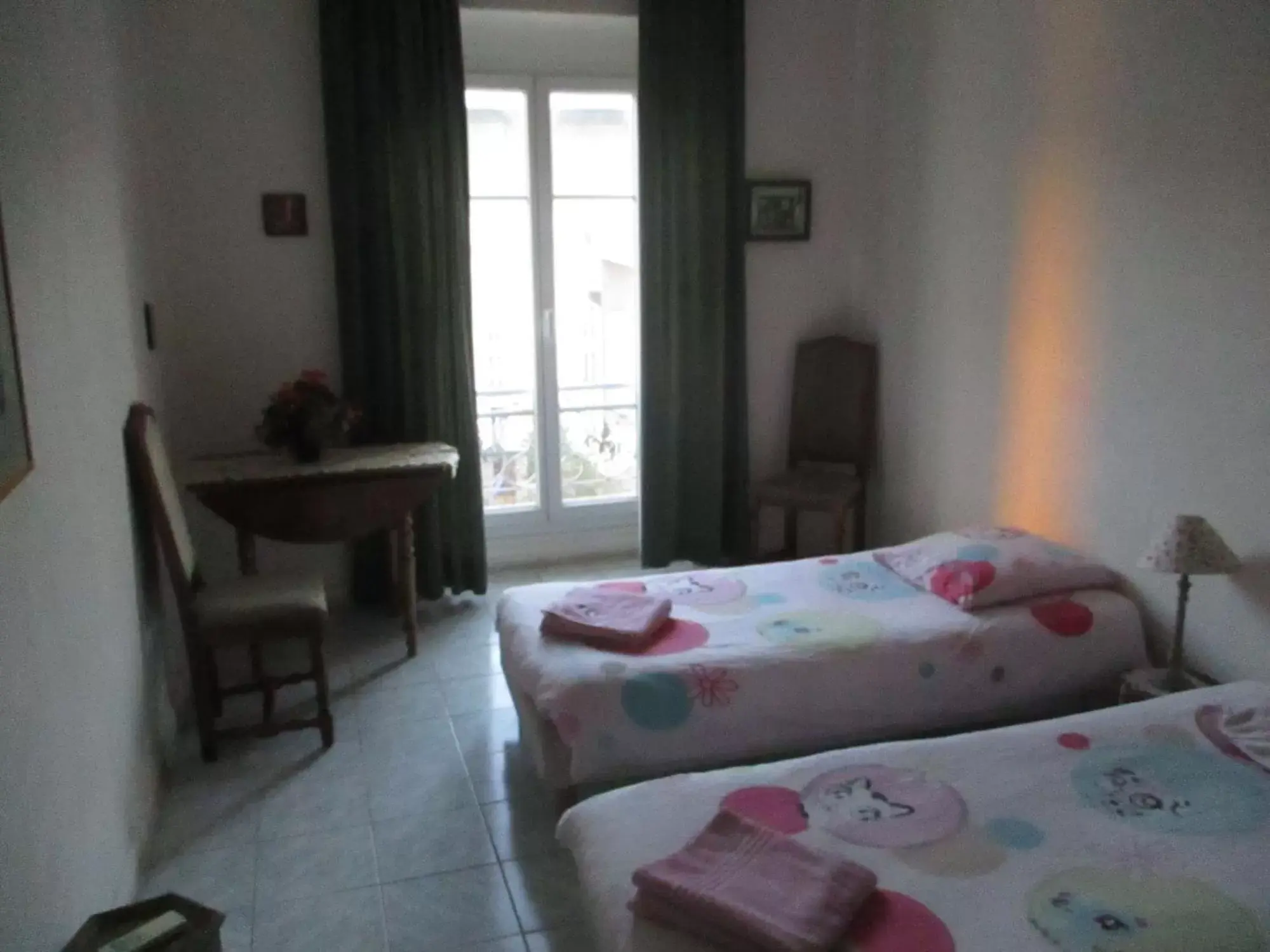 Living room, Bed in Chez Brigitte Guesthouse