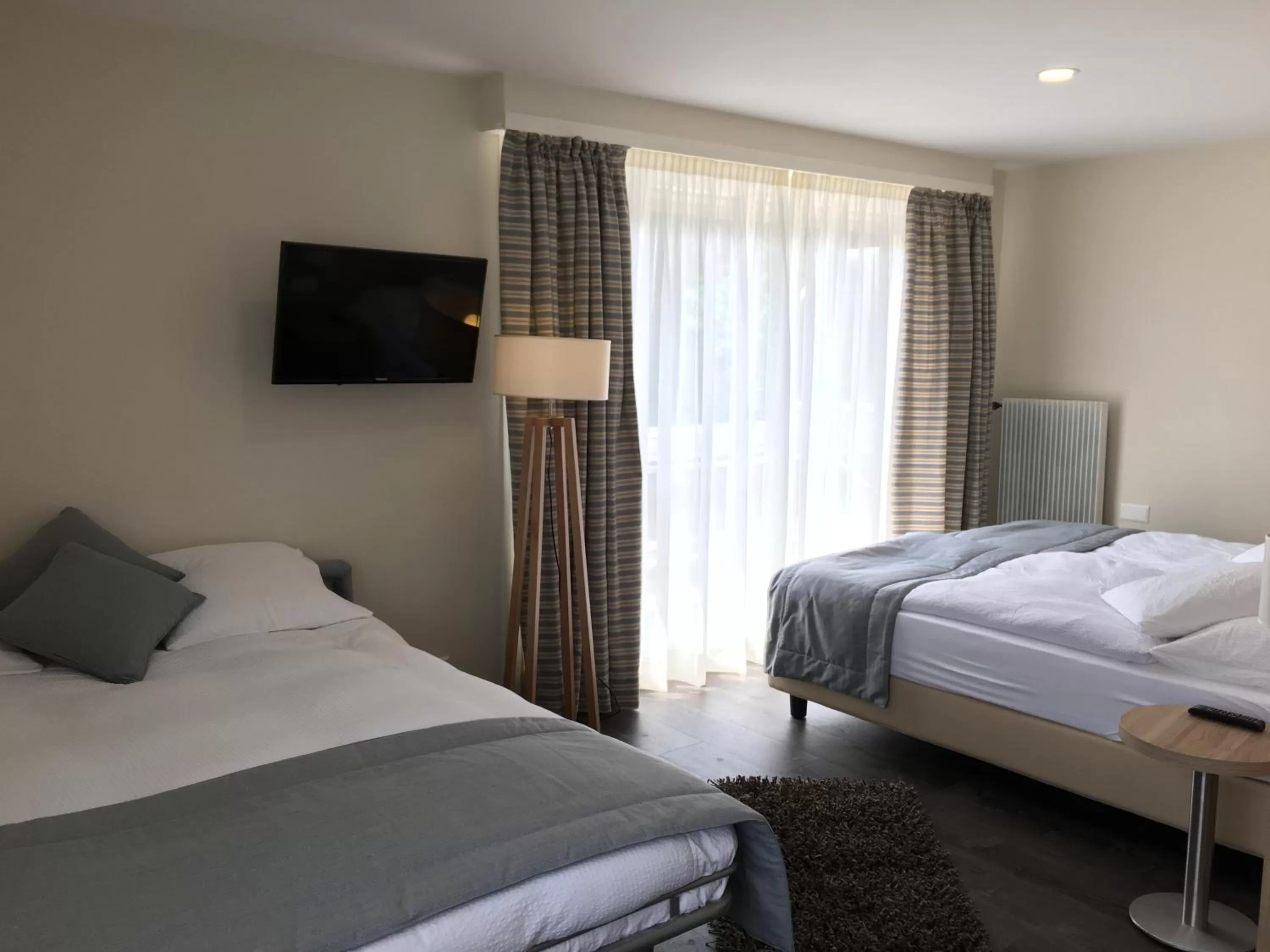 Photo of the whole room, Bed in Hôtel de Chailly