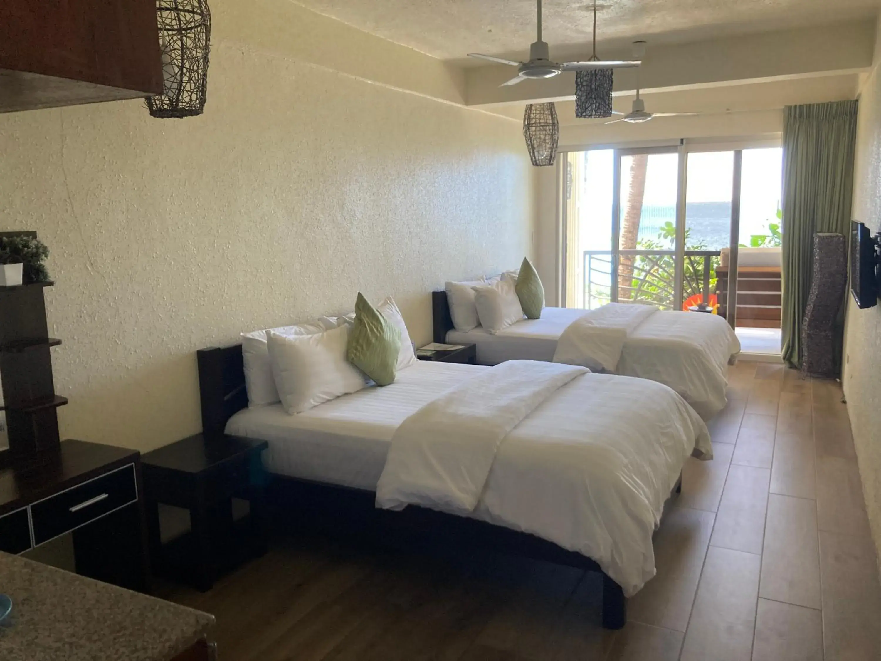 Family Room in Sunset At Aninuan Beach Resort Family Room in Sunset At Aninuan Beach Resort