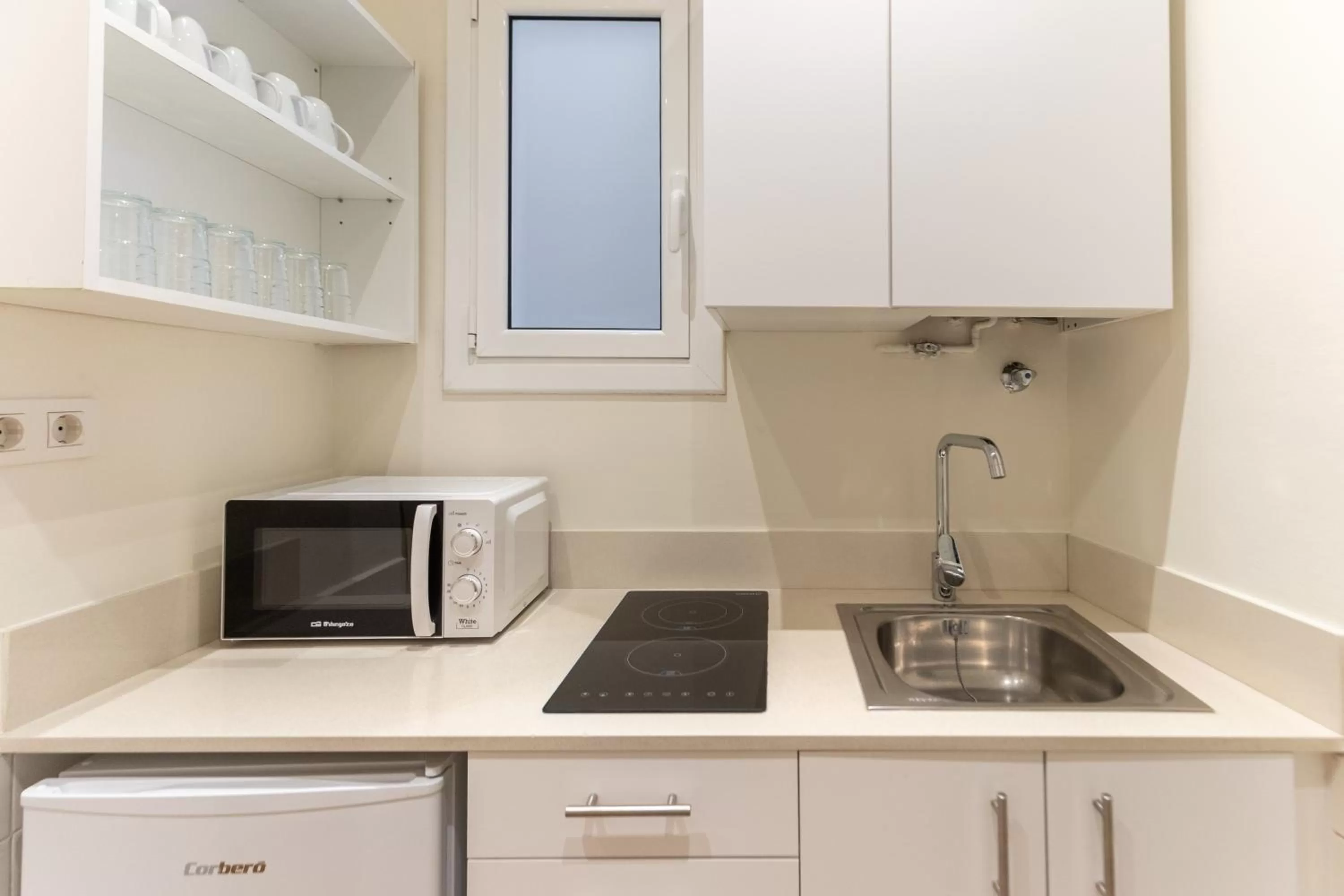 Kitchen or kitchenette in Atica Apartments - by Weflating
