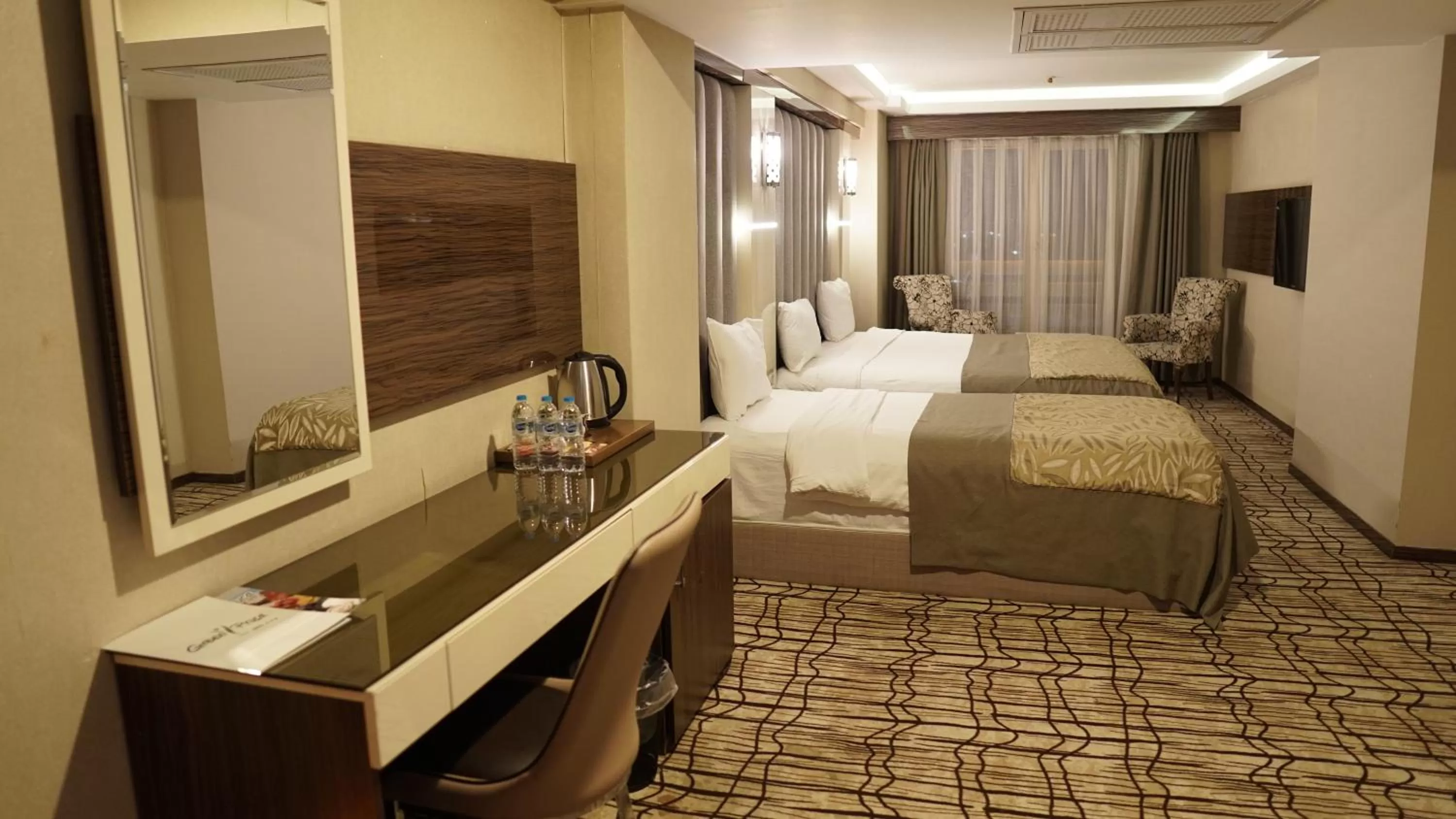 Bed in Green Prusa Hotel