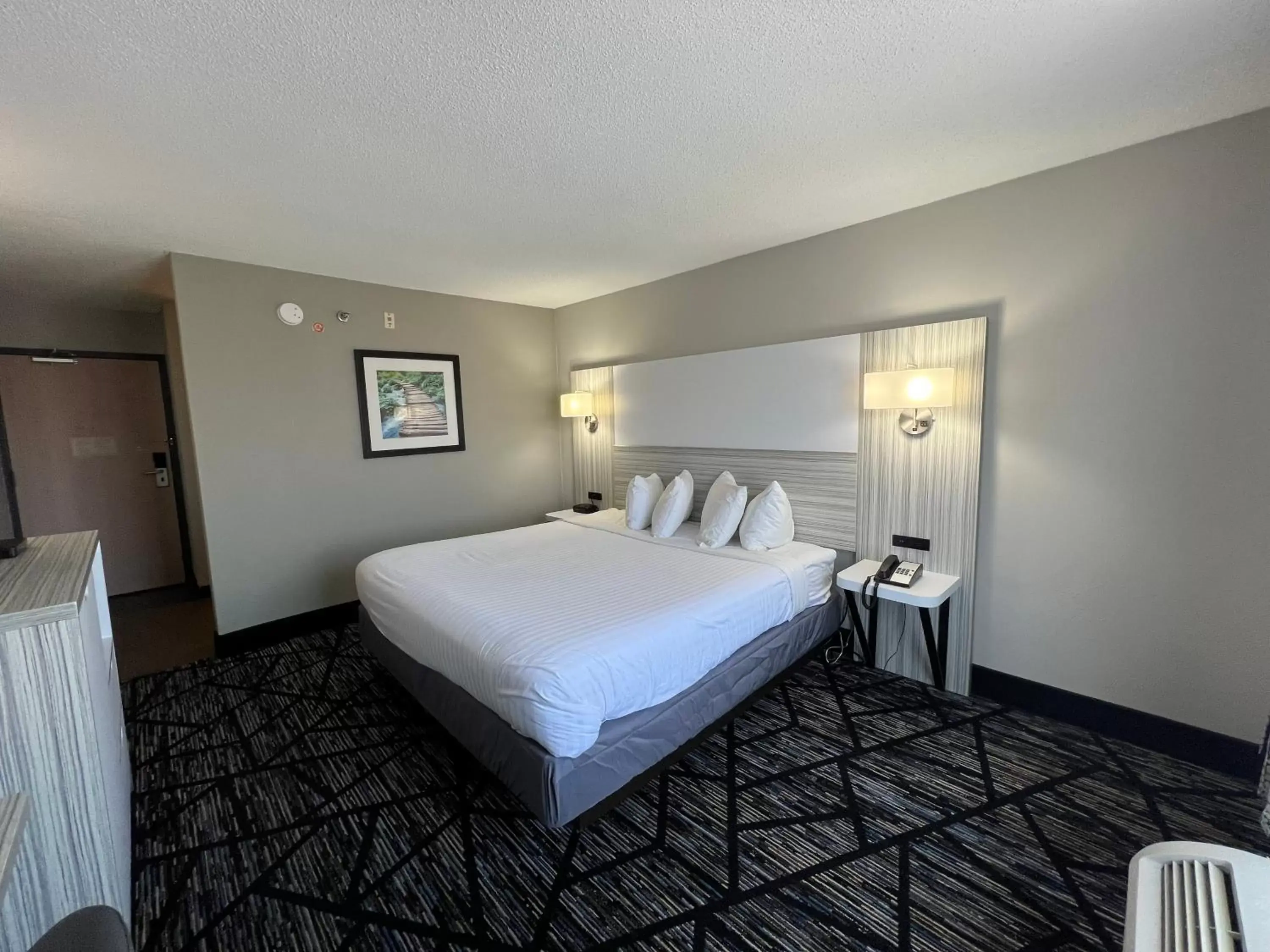 Bed in Baymont by Wyndham Peoria