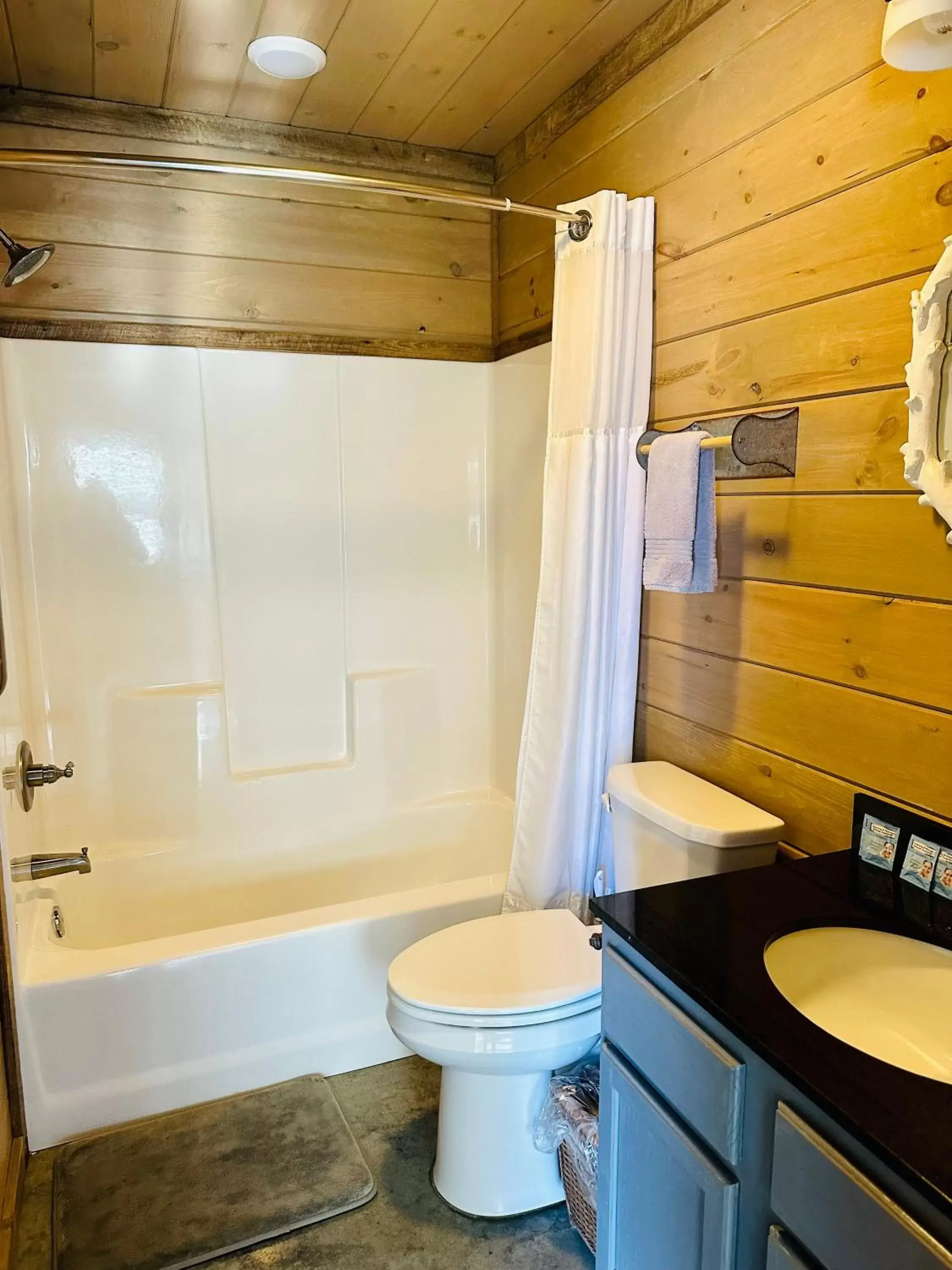 Shower, Bathroom in Knotty Squirrel Cabins