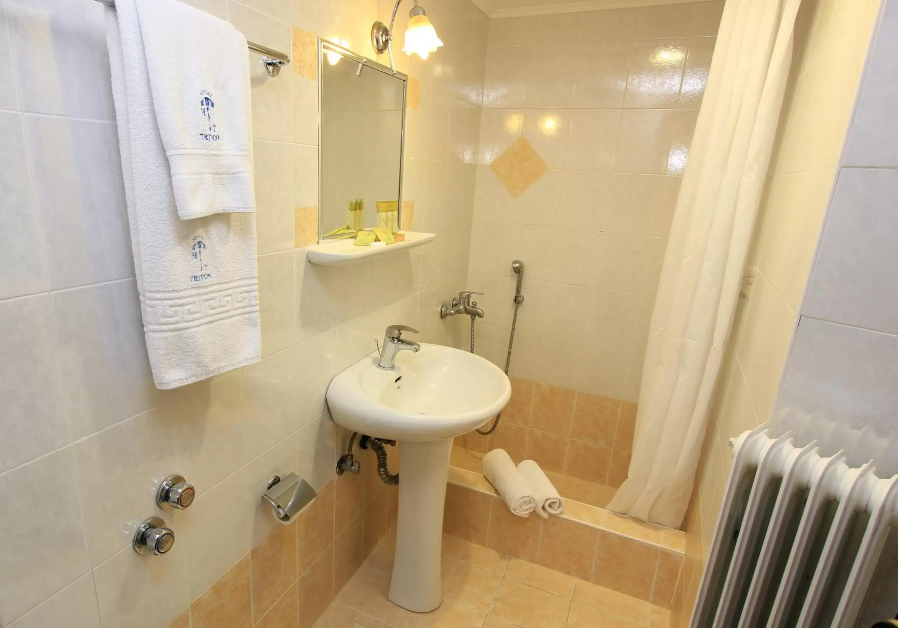 Bathroom in Triton Hotel Piraeus