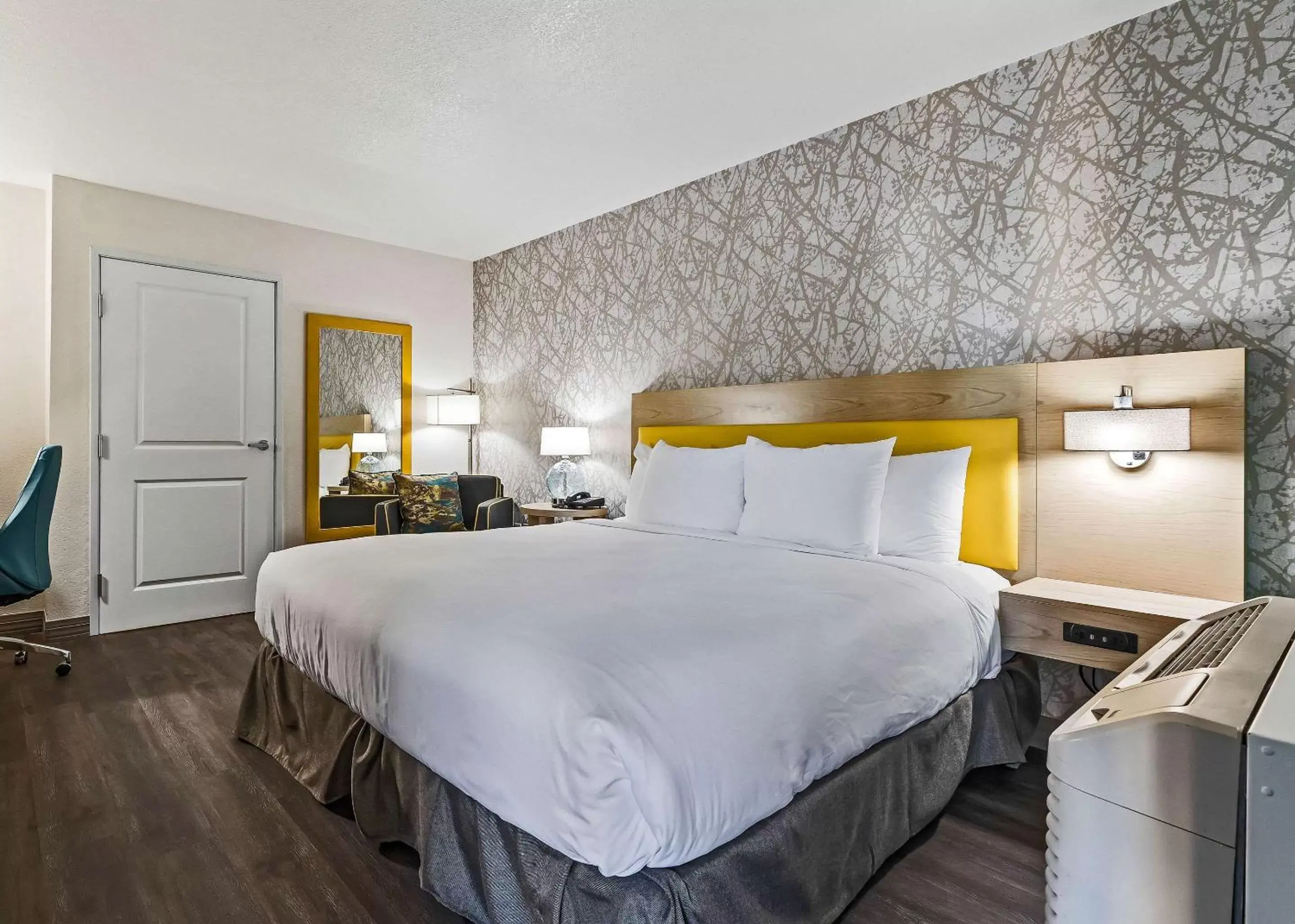 Bedroom, Bed in Hillstone Inn Tulare, Ascend Hotel Collection