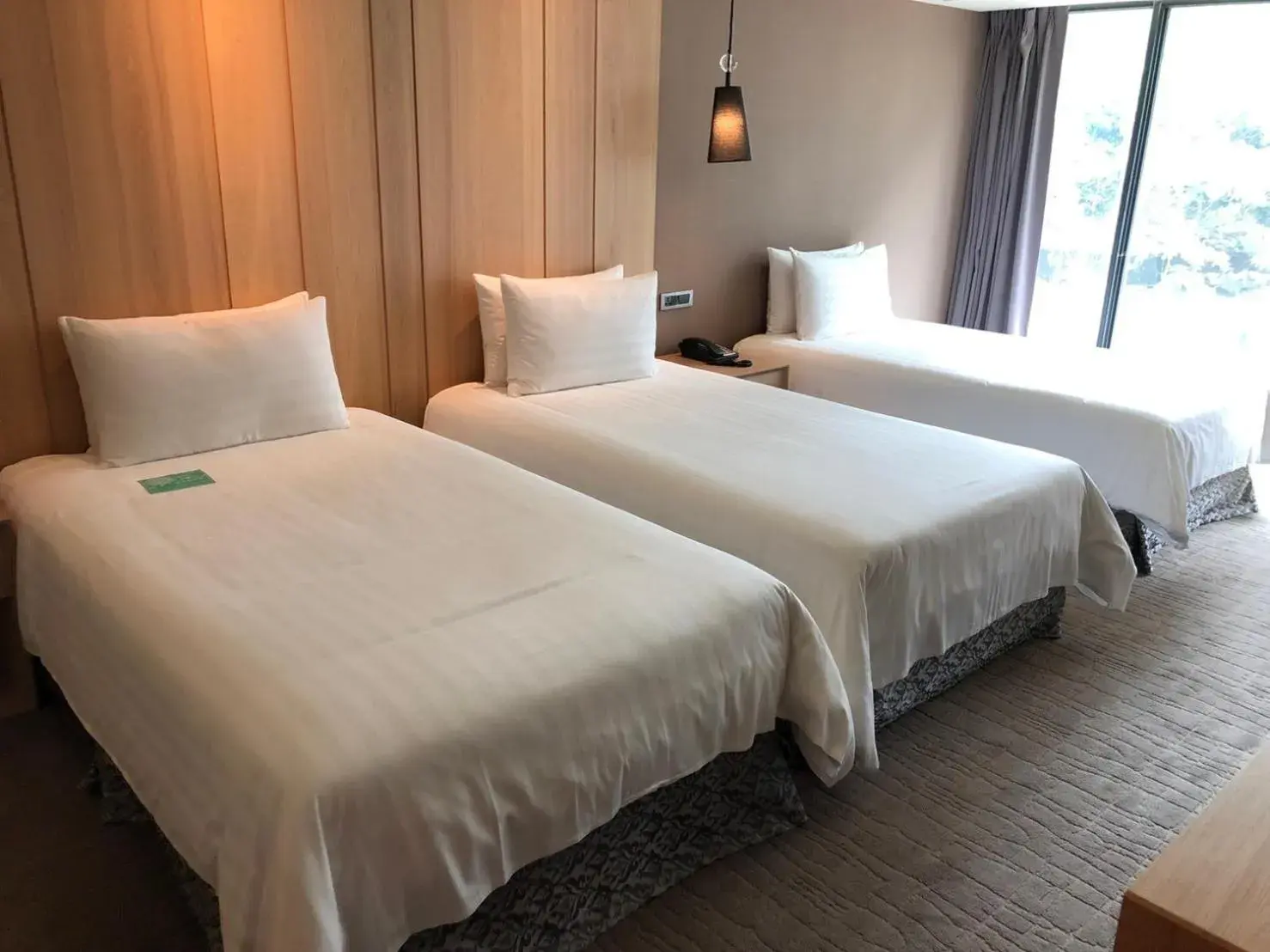 Bed in La Maison Hotel