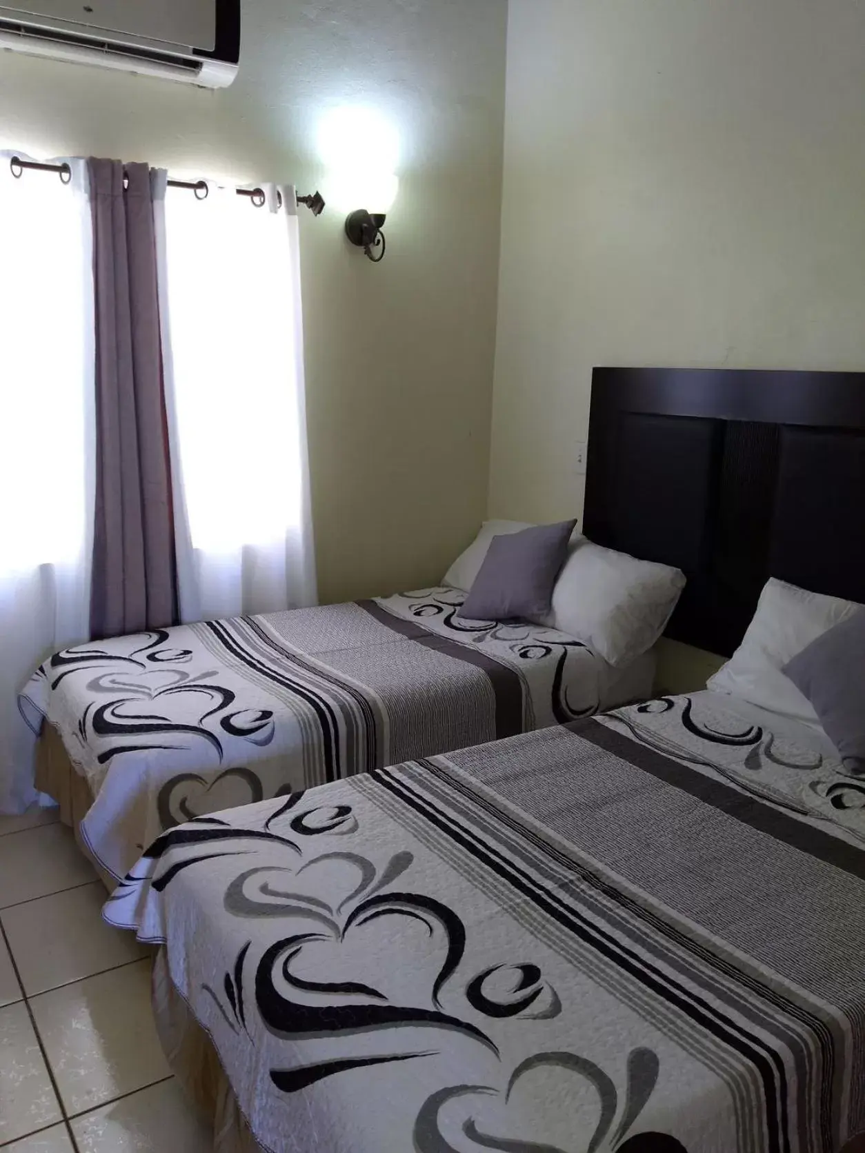 Classic Twin Room with Balcony - single occupancy in Connie's Comfort Suites Classic Twin Room with Balcony - single occupancy in Connie's Comfort Suites