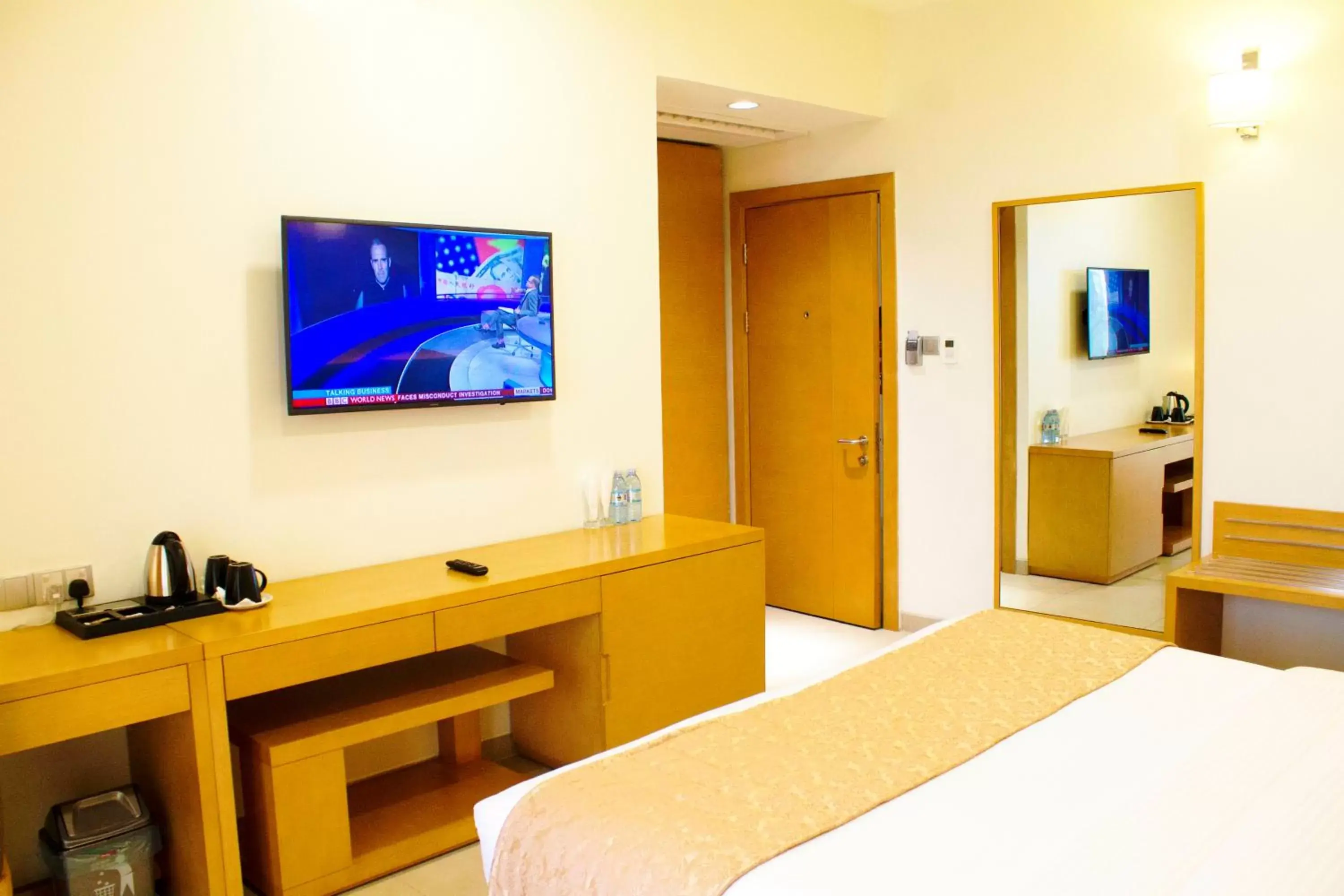 Photo of the whole room, TV/Entertainment Center in K Hotels Entebbe