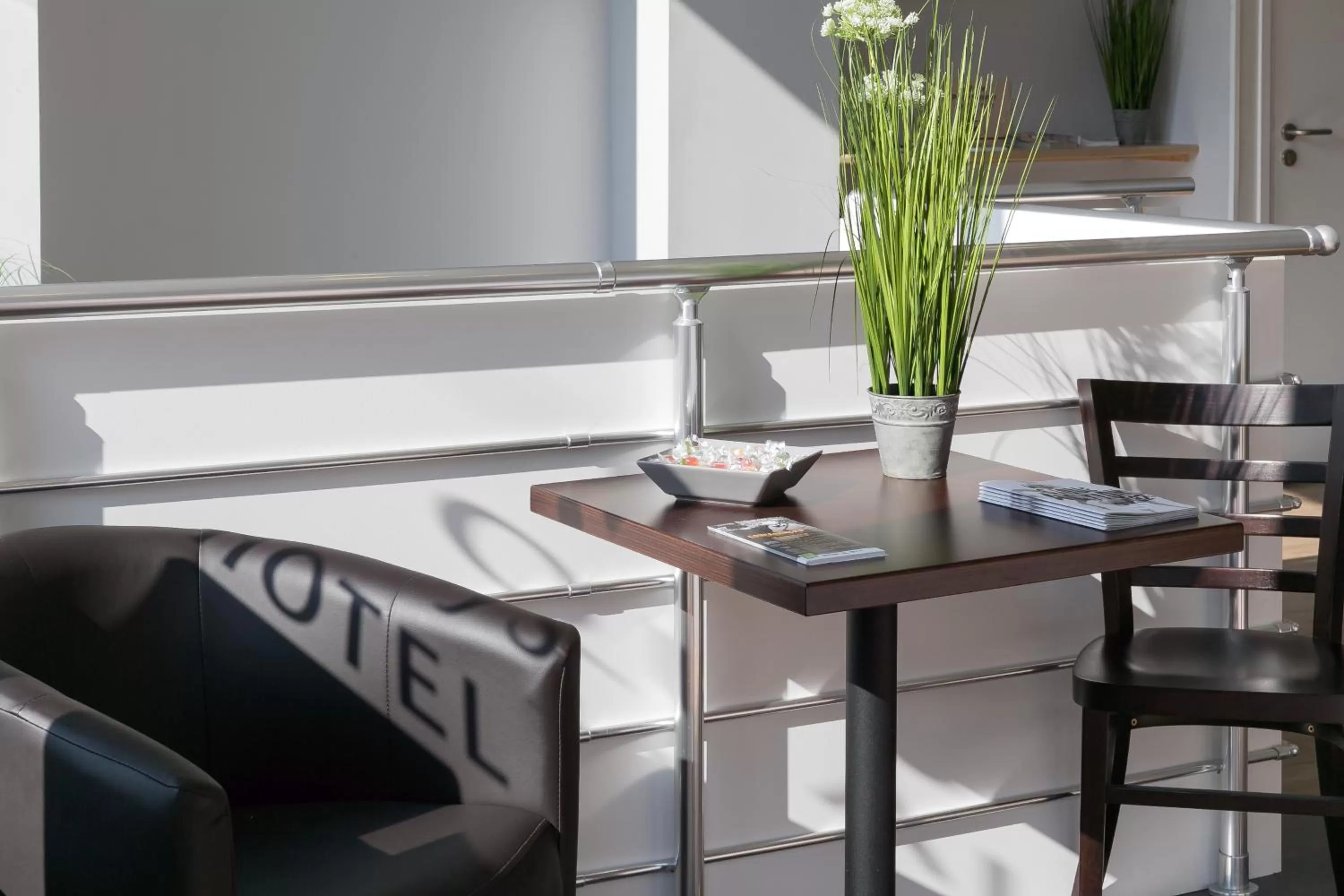 Communal lounge/ TV room in Hotel Foch Nancy Gare