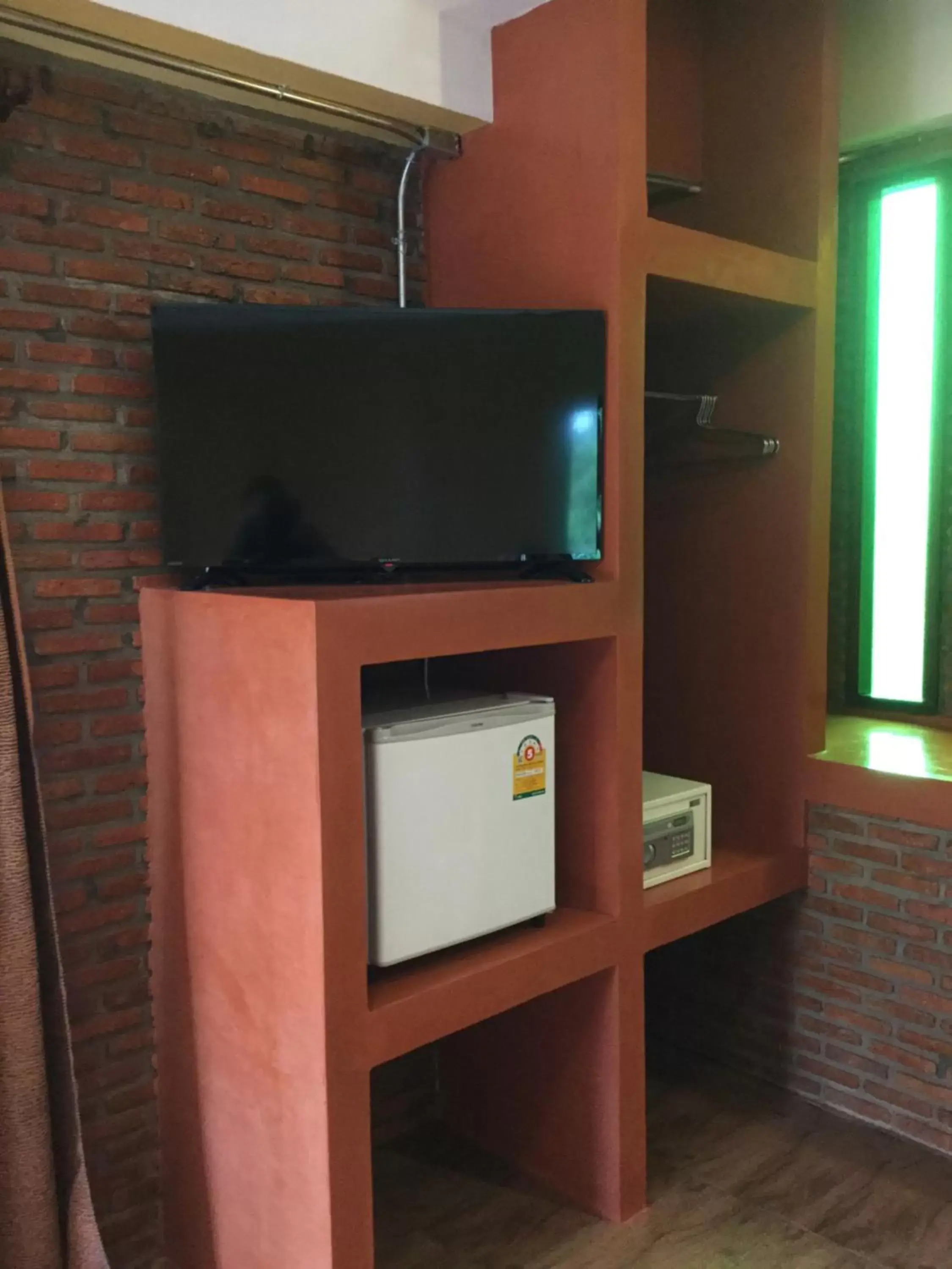 TV and multimedia, TV/Entertainment Center in Pongphen Guesthouse - SHA Plus Certified