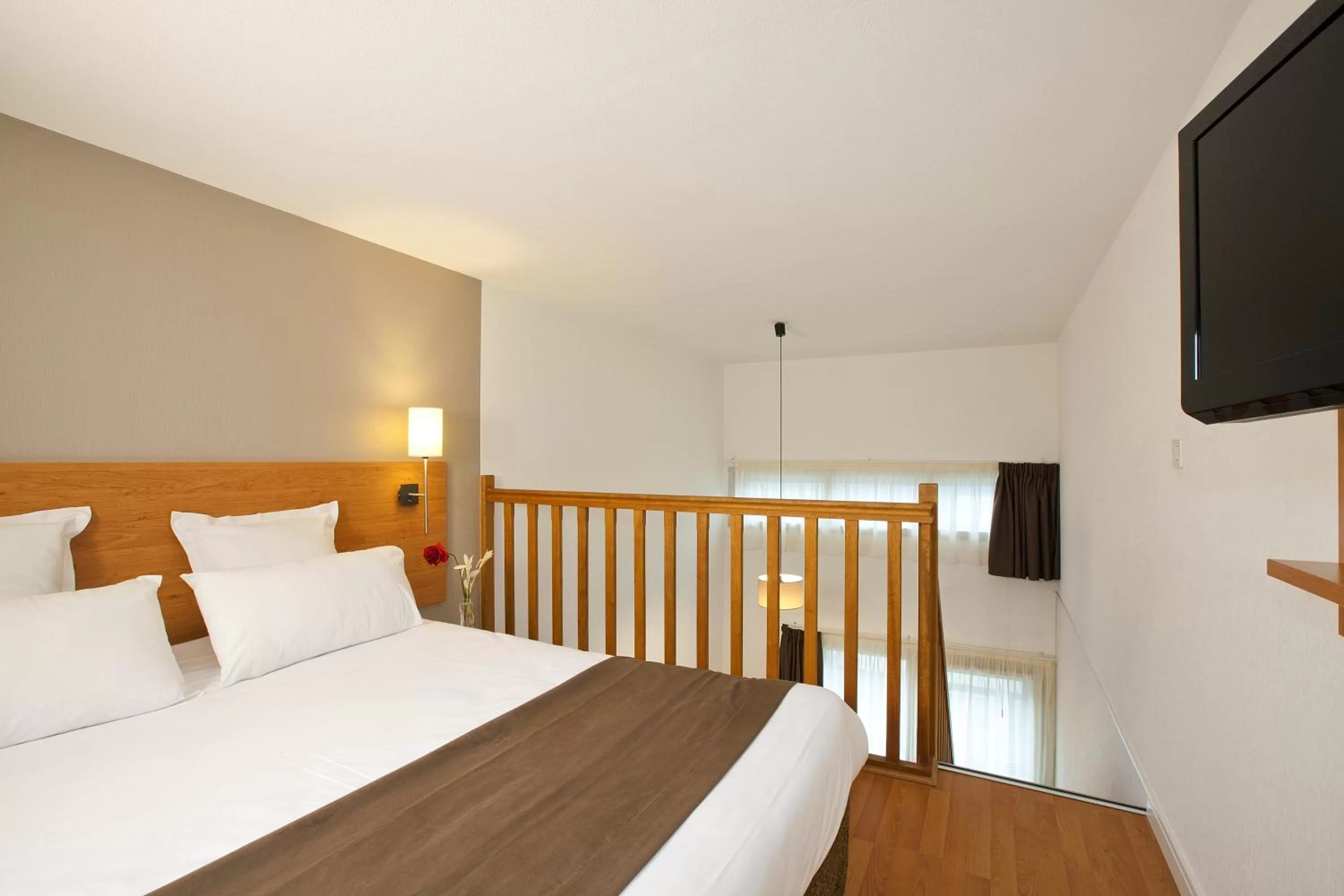 Bed in Séjours & Affaires Nantes Ducs De Bretagne