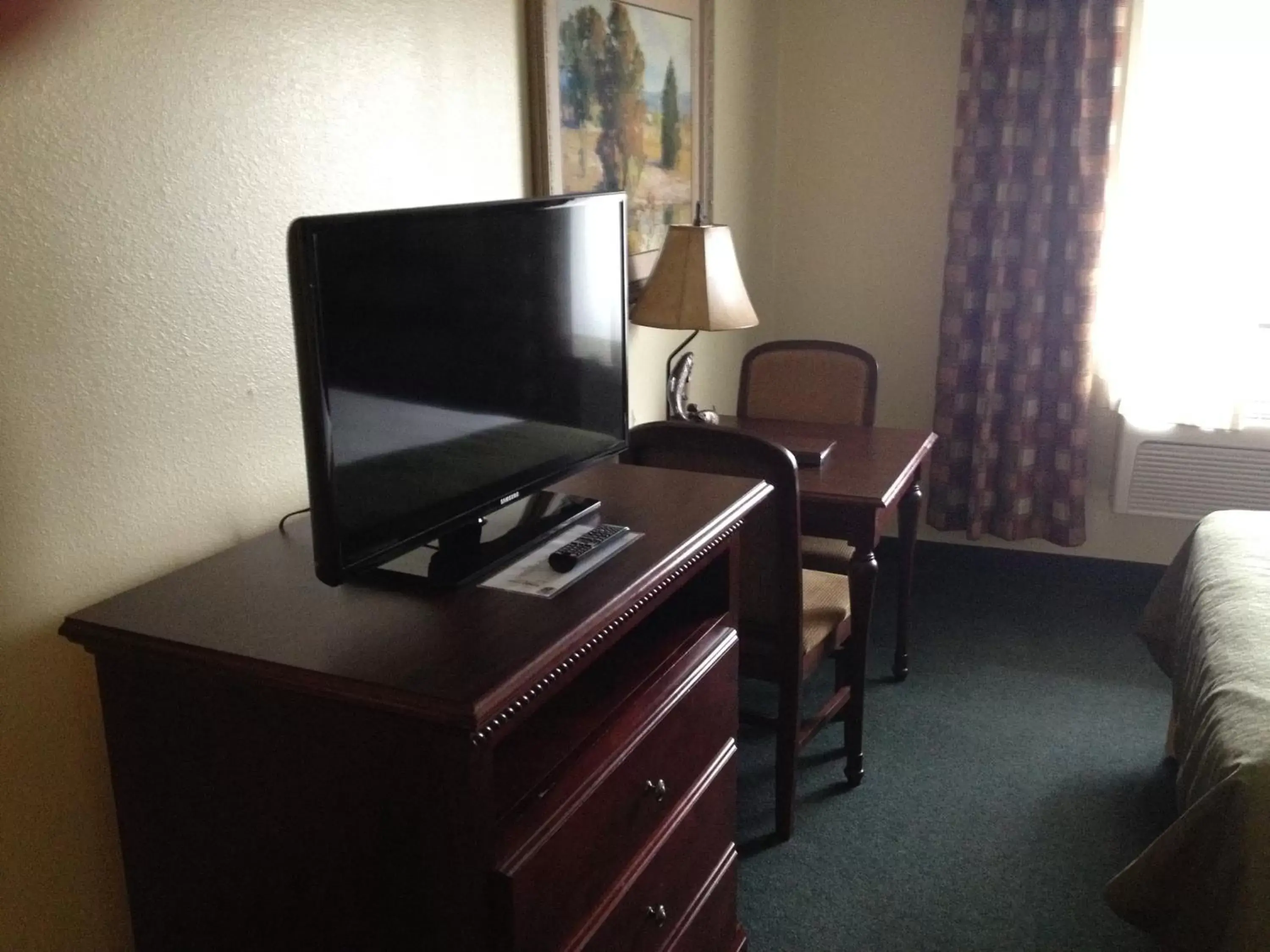 TV and multimedia, TV/Entertainment Center in Super 8 by Wyndham McCall
