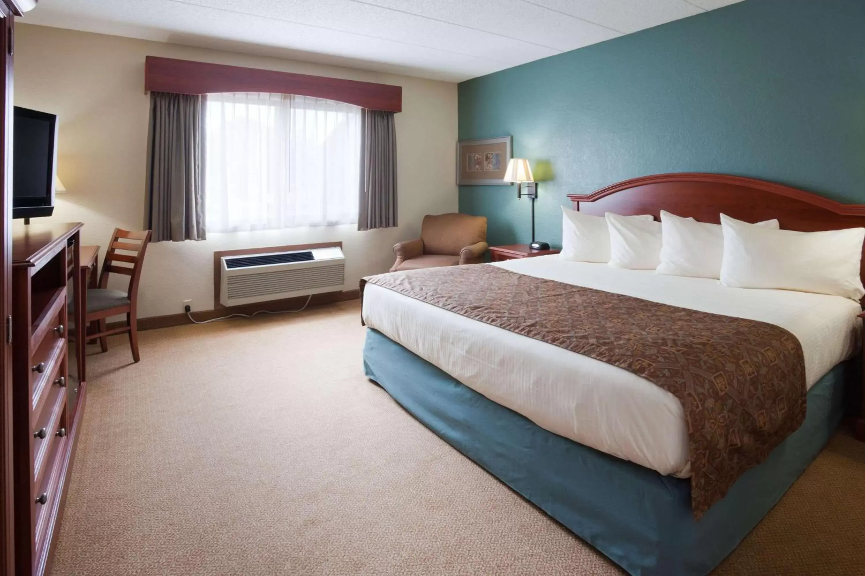 Photo of the whole room, Bed in AmericInn by Wyndham St. Peter