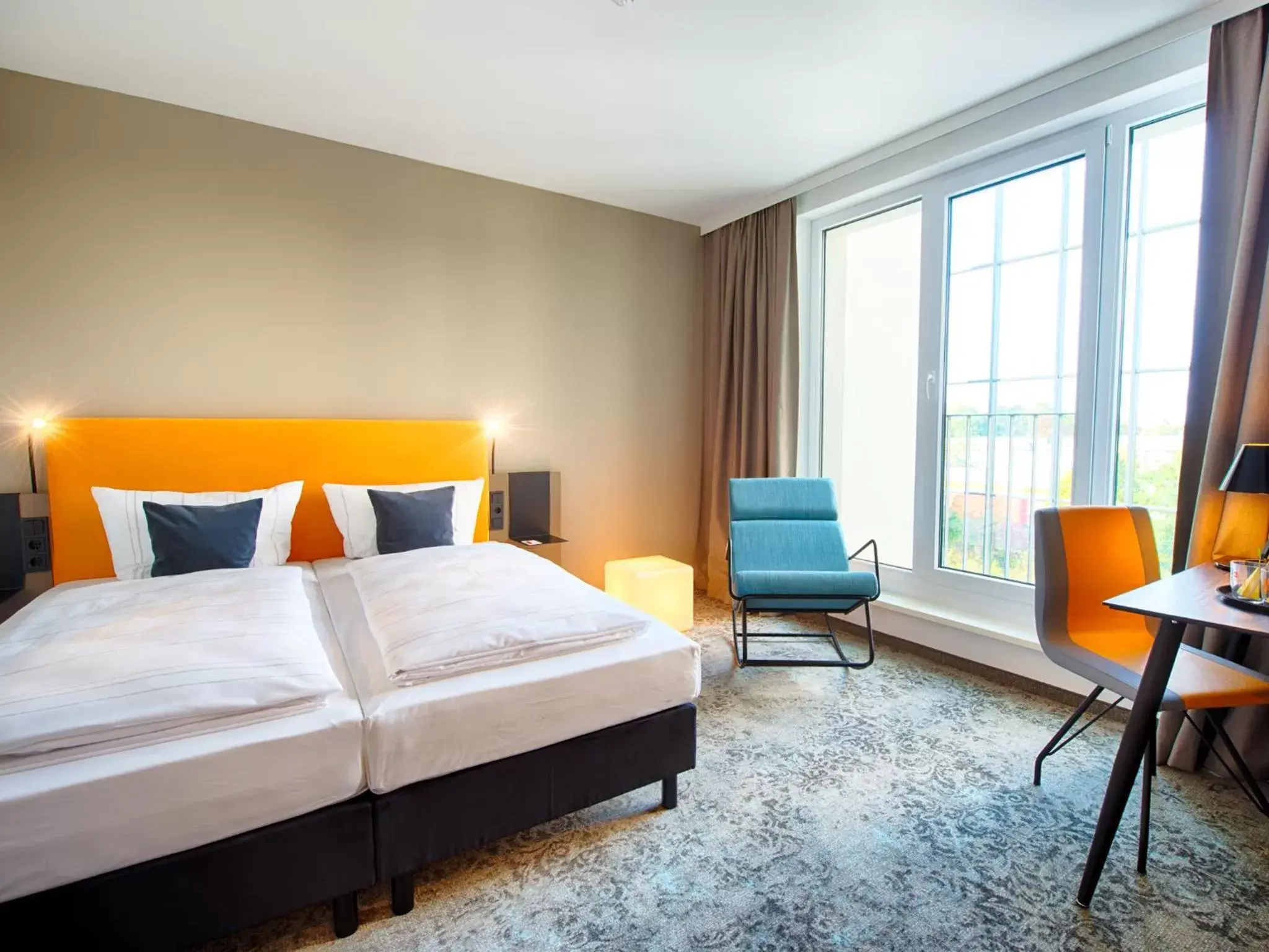 Photo of the whole room, Bed in LOGINN Hotel Leipzig by ACHAT