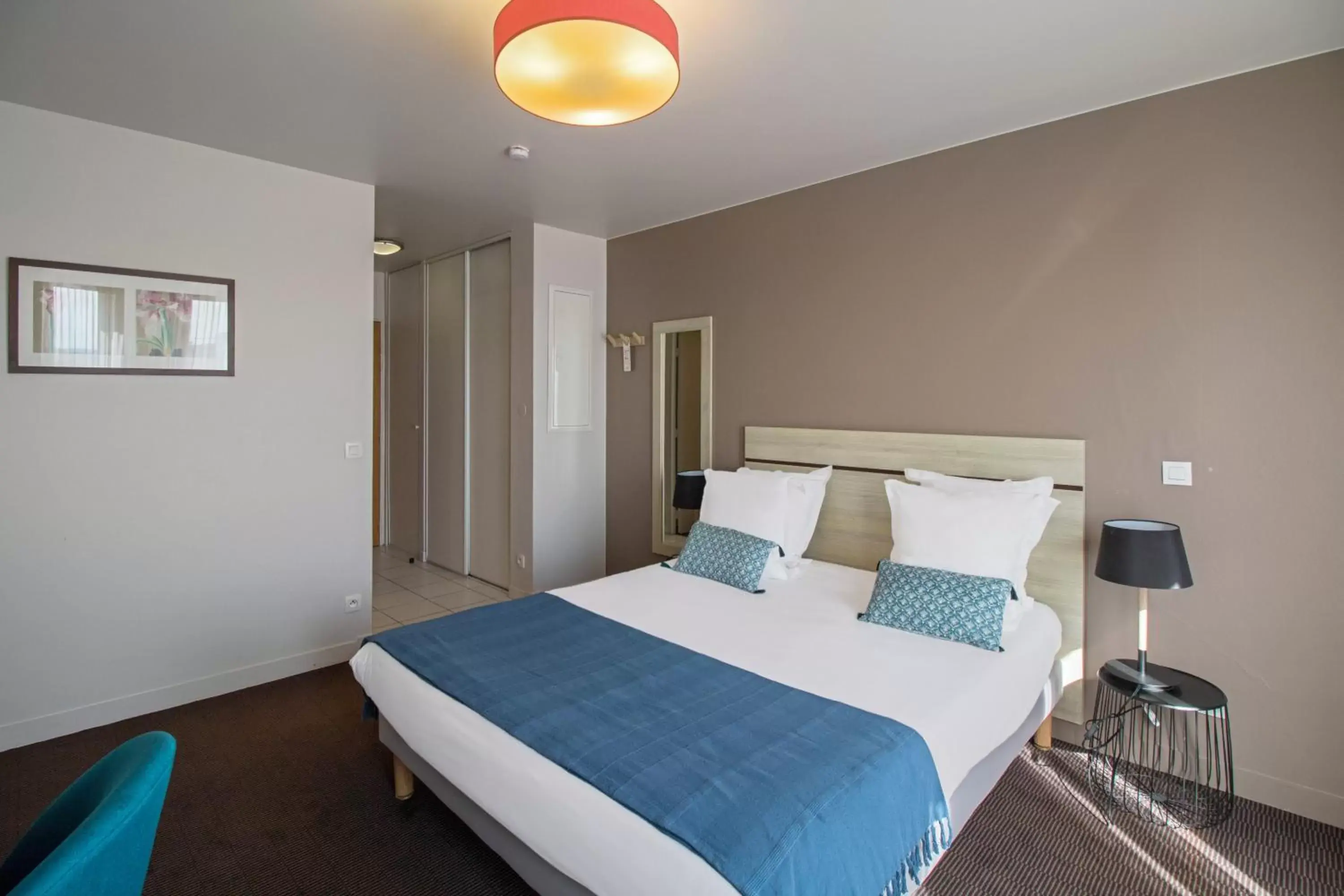 Bedroom, Bed in Appart'City Confort Paris Villejuif (Ex Park&Suites)