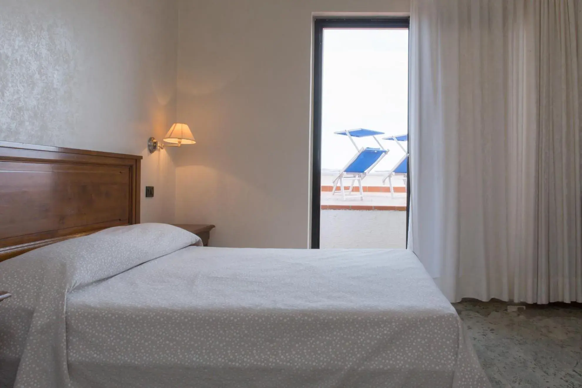 Property building, Bed in Hotel Arcobaleno Property building, Bed in Hotel Arcobaleno
