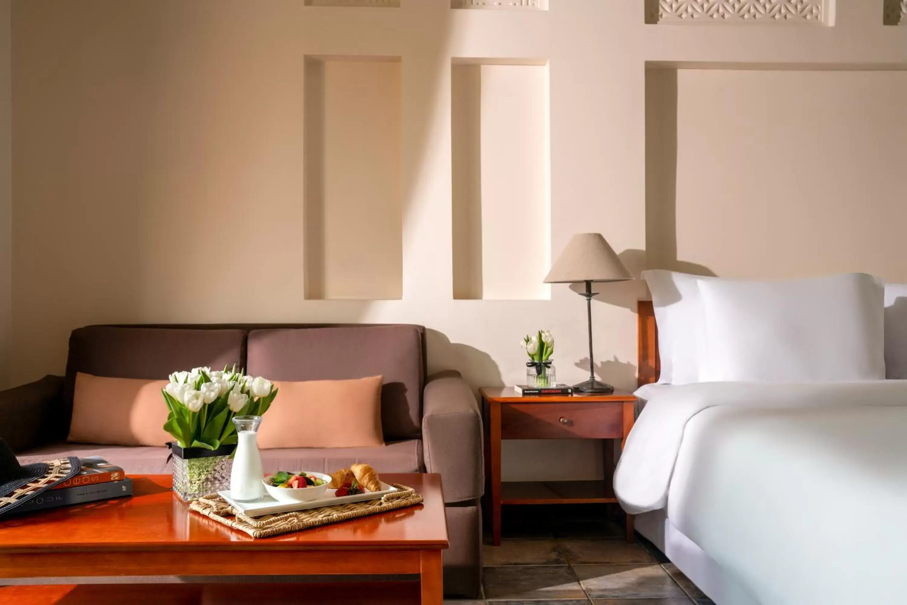 Bed, Seating Area in Novotel Bahrain Al Dana Resort