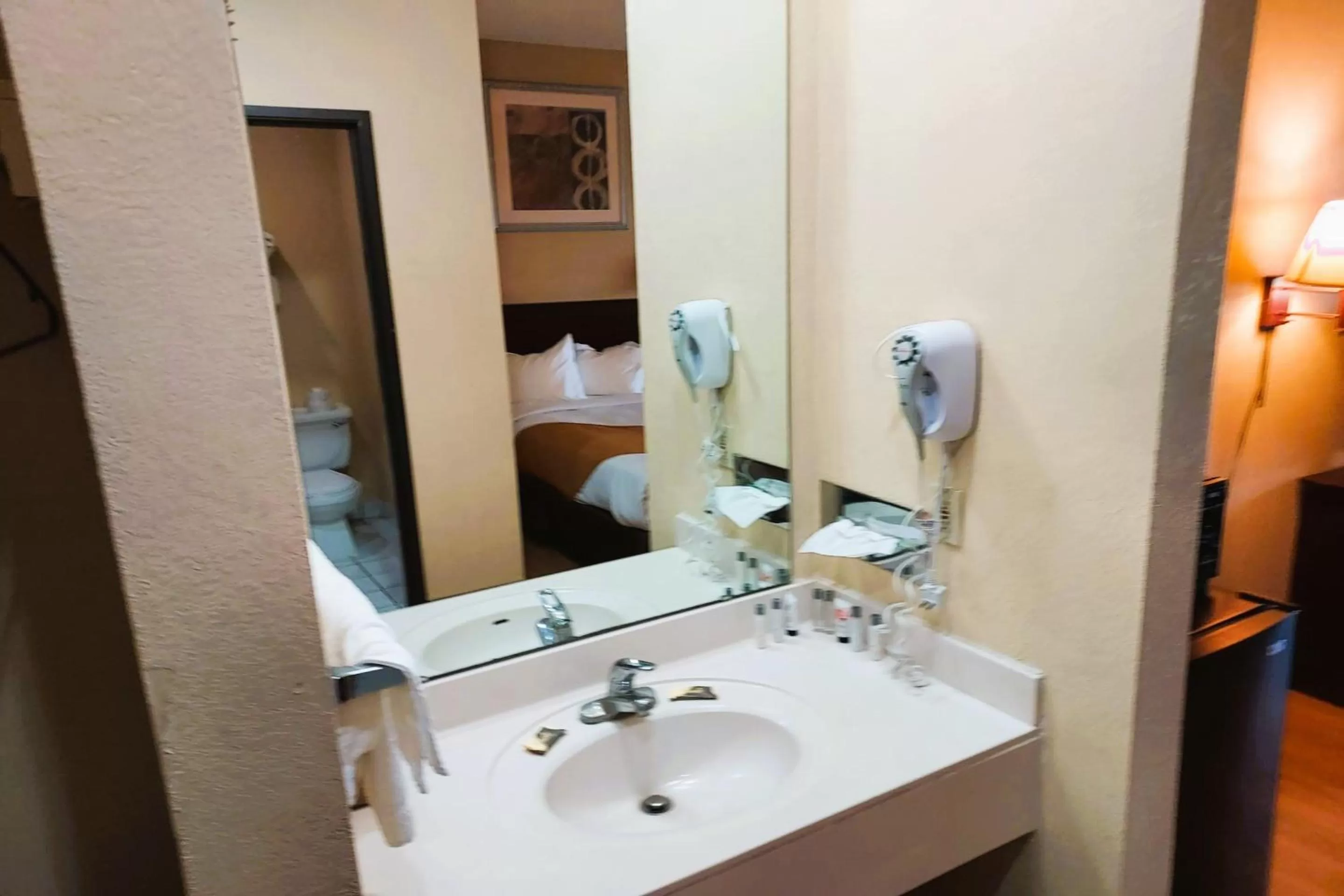 Bathroom in McPherson Inn By OYO, I-135