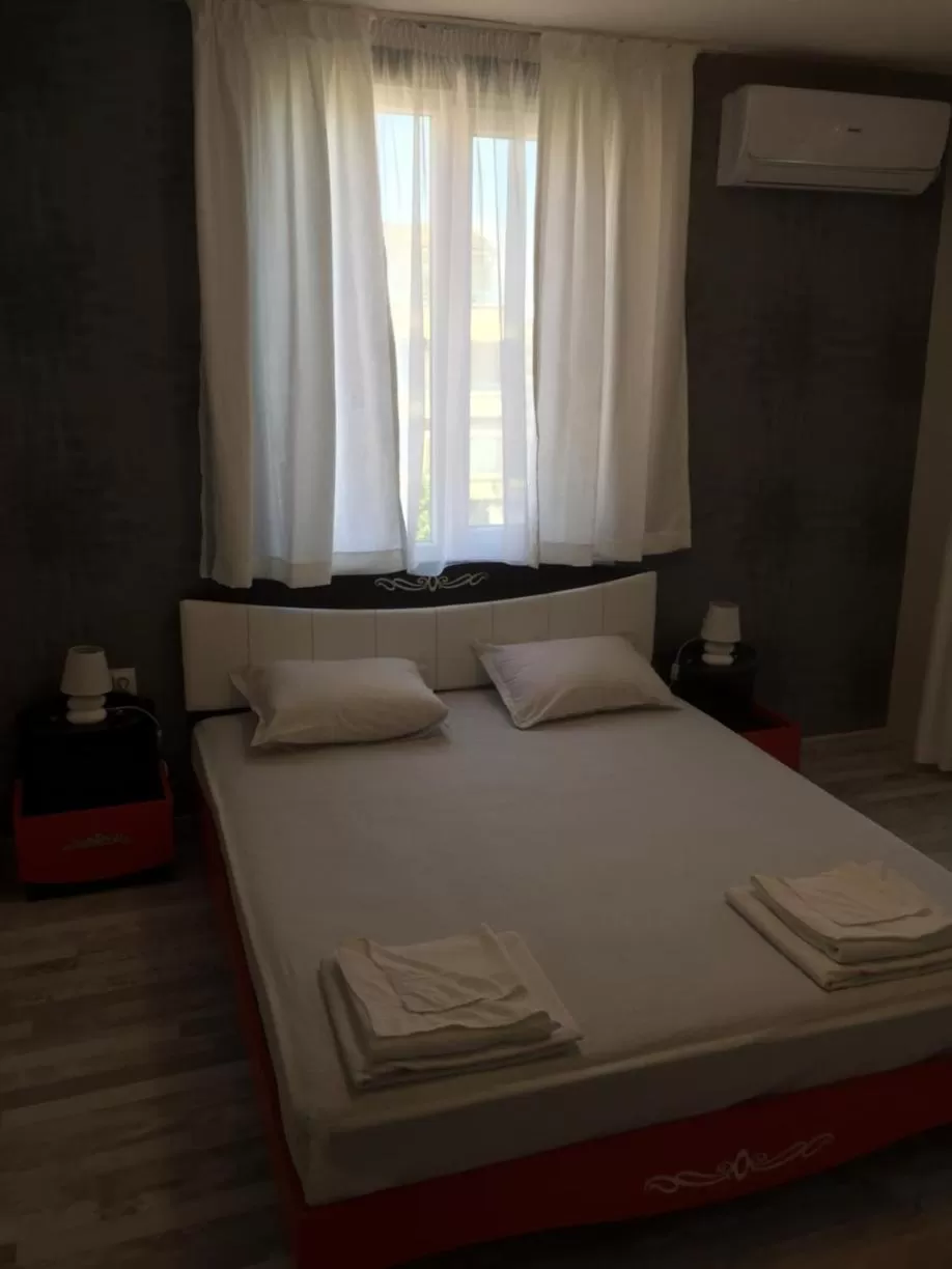 Bed in Family Hotel Malibu