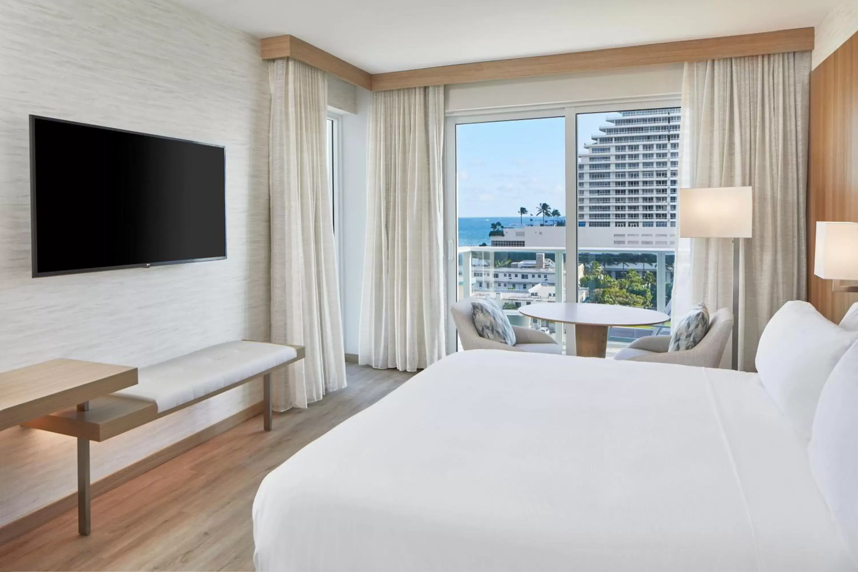 Photo of the whole room, TV/Entertainment Center in AC Hotel by Marriott Fort Lauderdale Beach