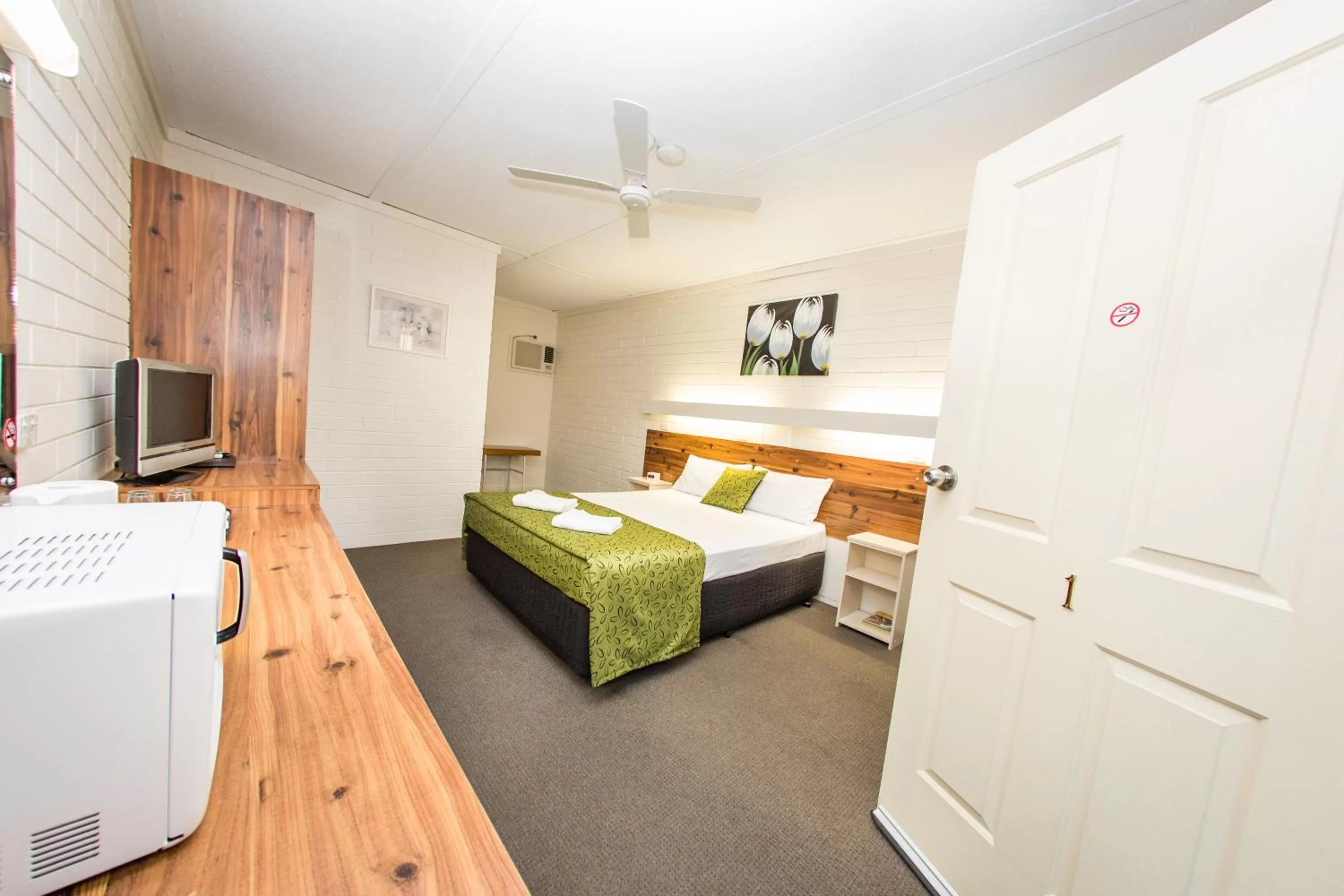 Bed in 7th Street Motel