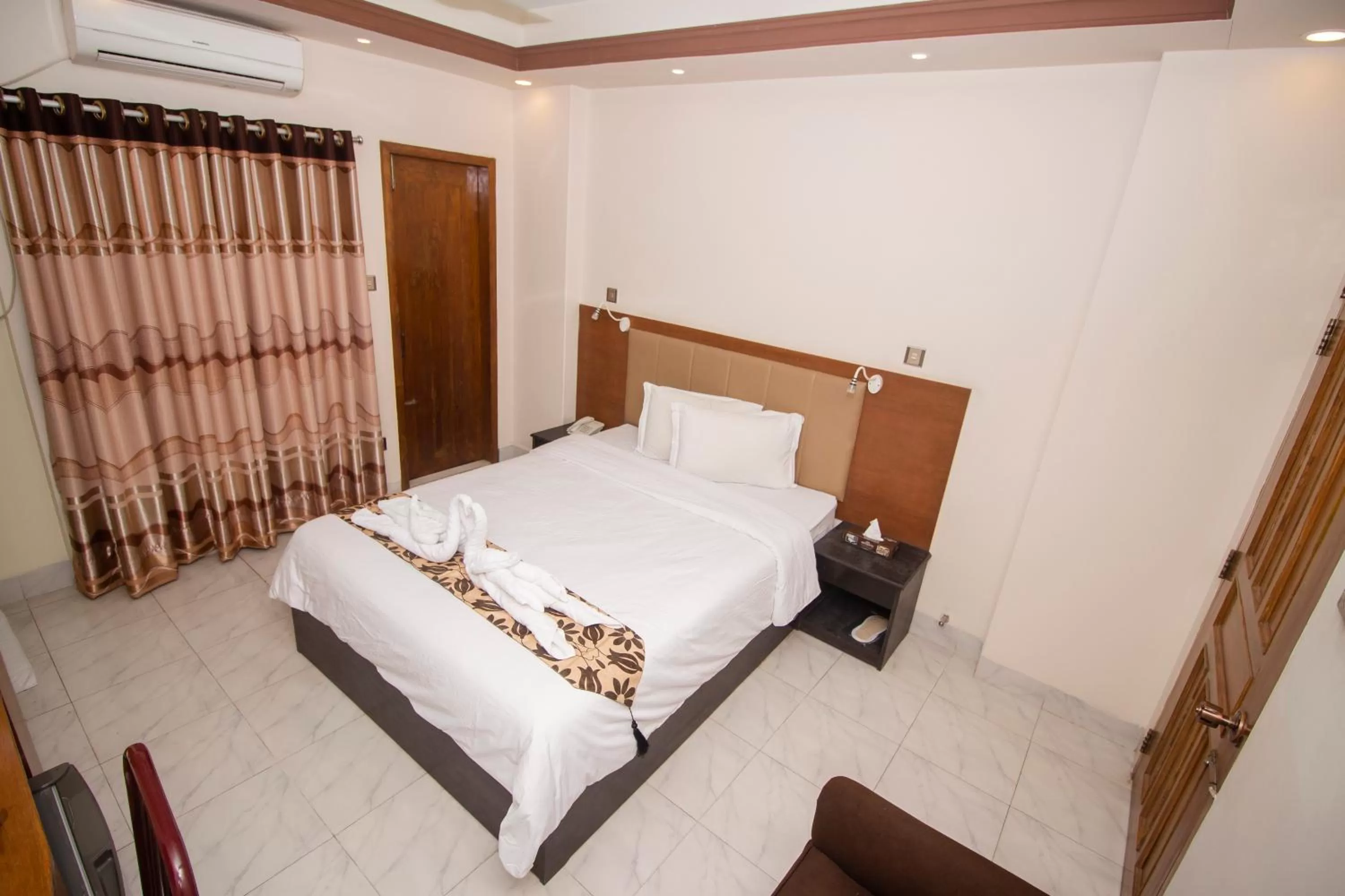 Bed in Memento Residence