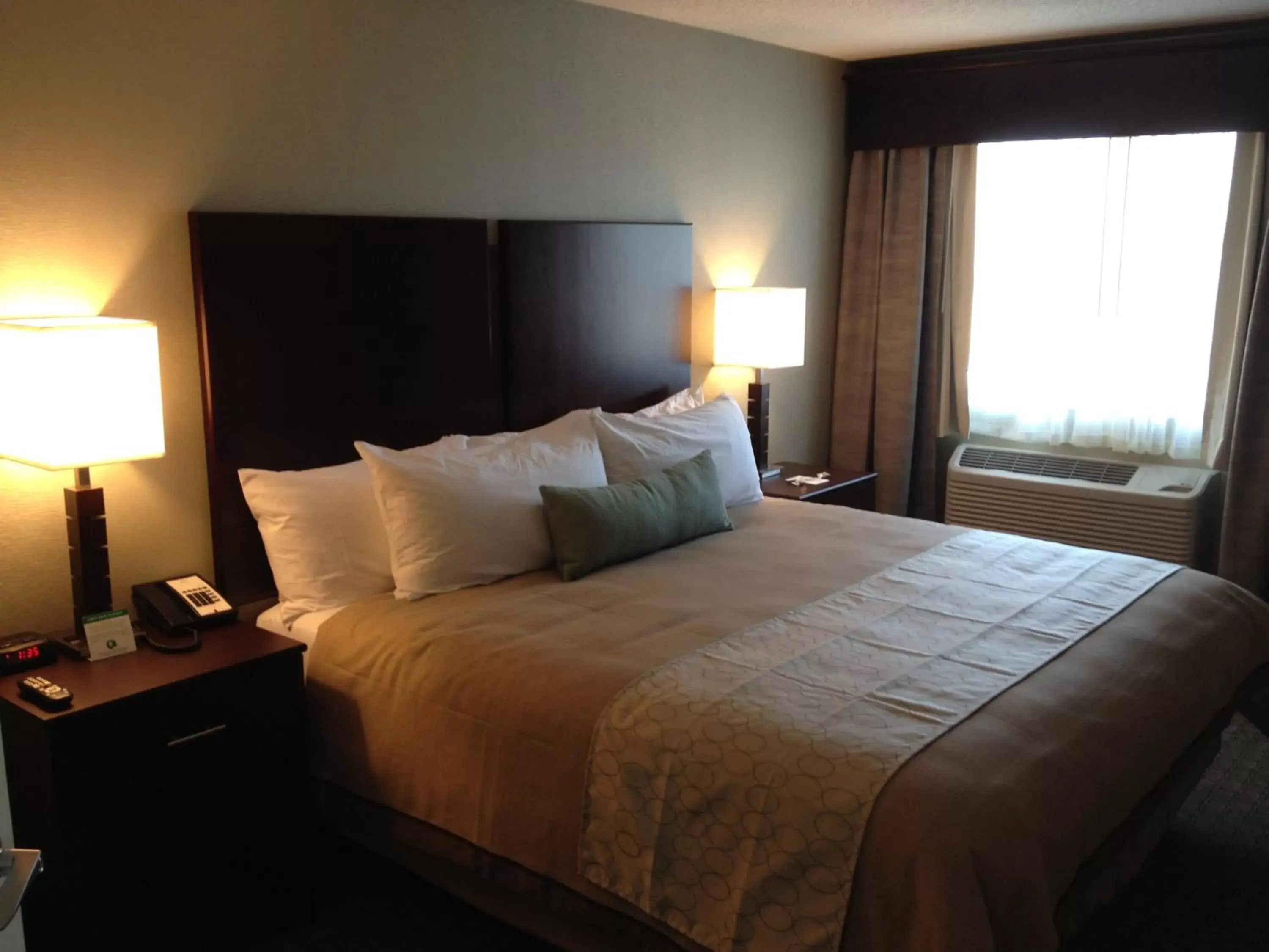 Bed in GrandStay Hotel & Suites - Glenwood