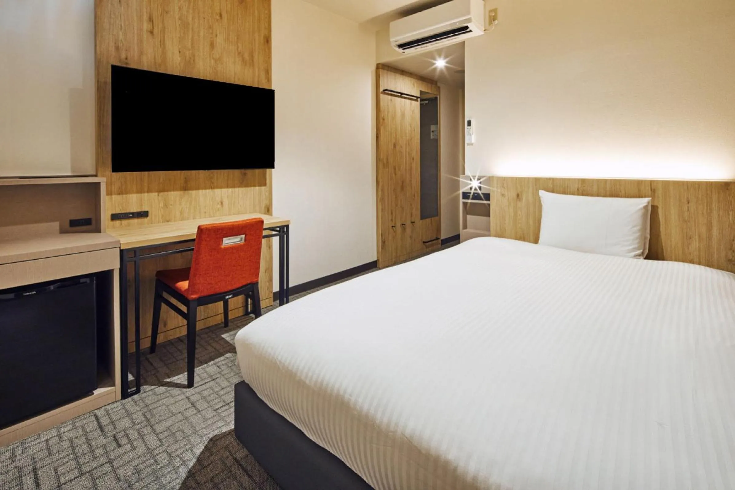 Bed in Hotel Lumiere Kasai