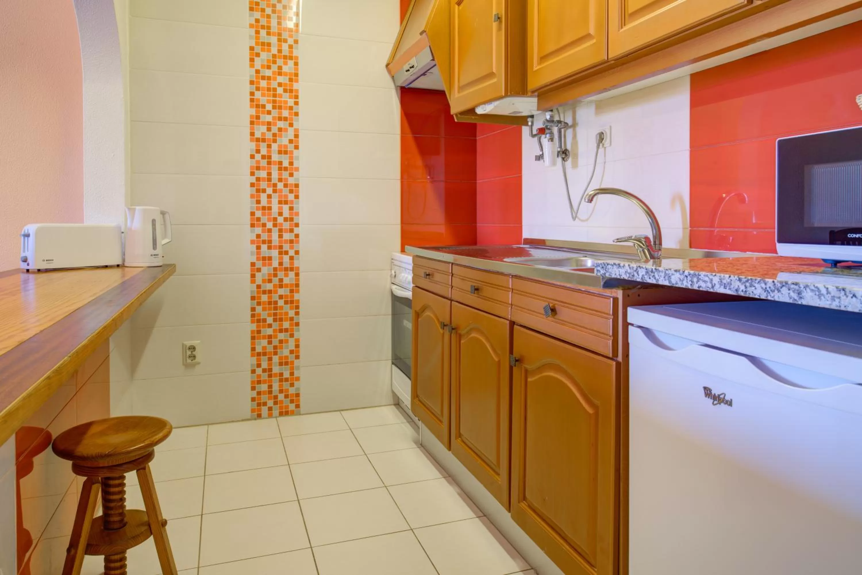 Kitchen or kitchenette in Choromar Apartments