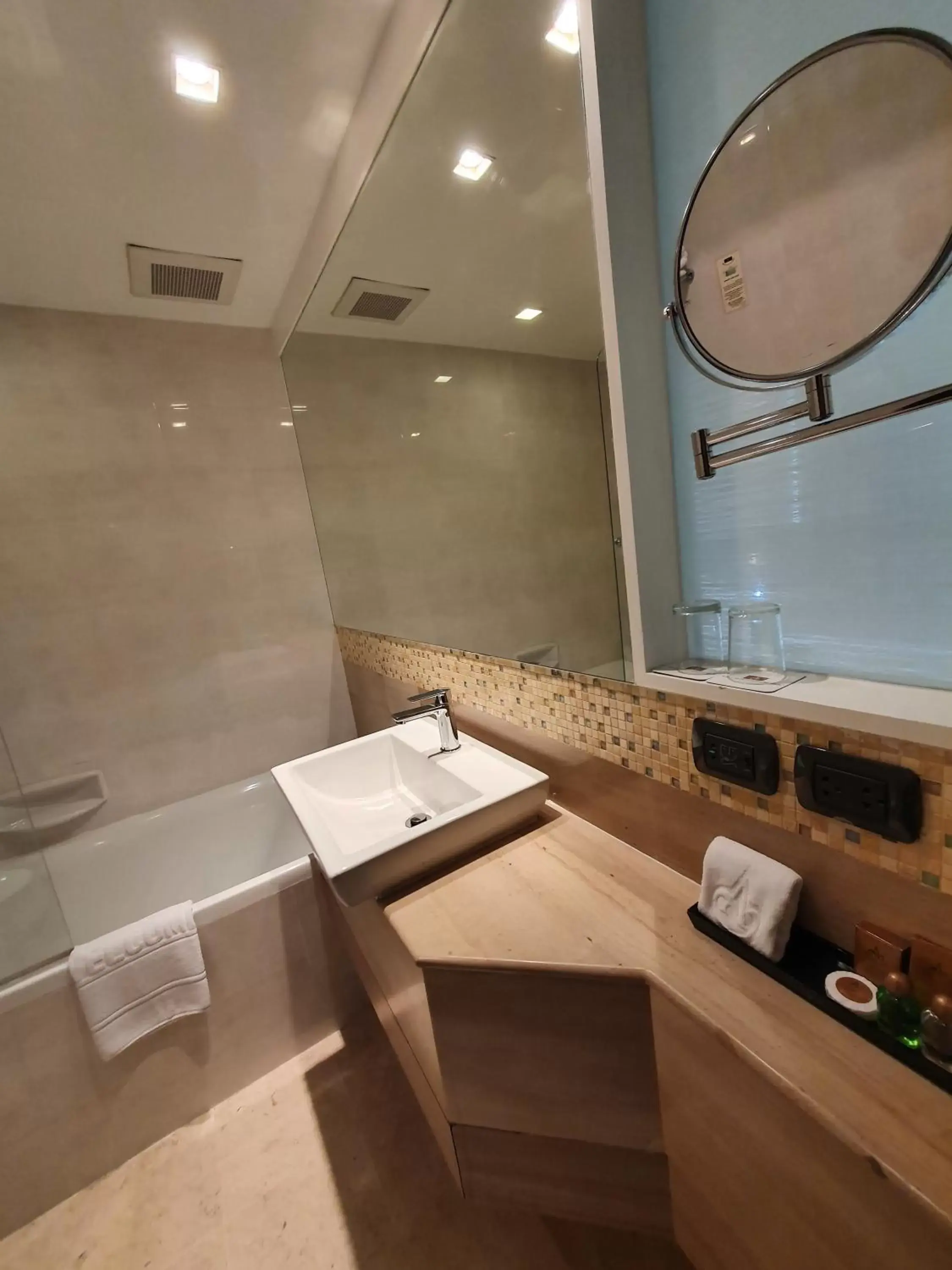 Bathroom in Amora NeoLuxe Suites Hotel
