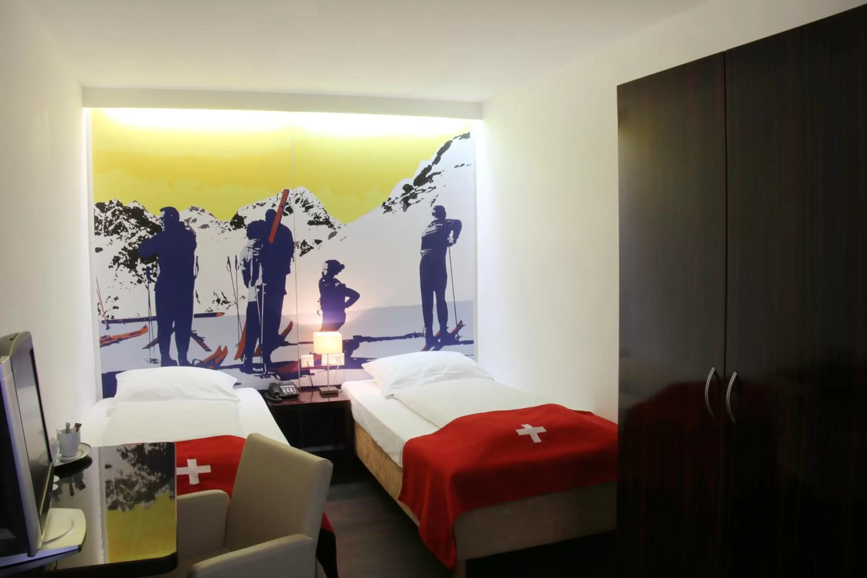 Bedroom, Bed in Helvetia Hotel Munich City Center