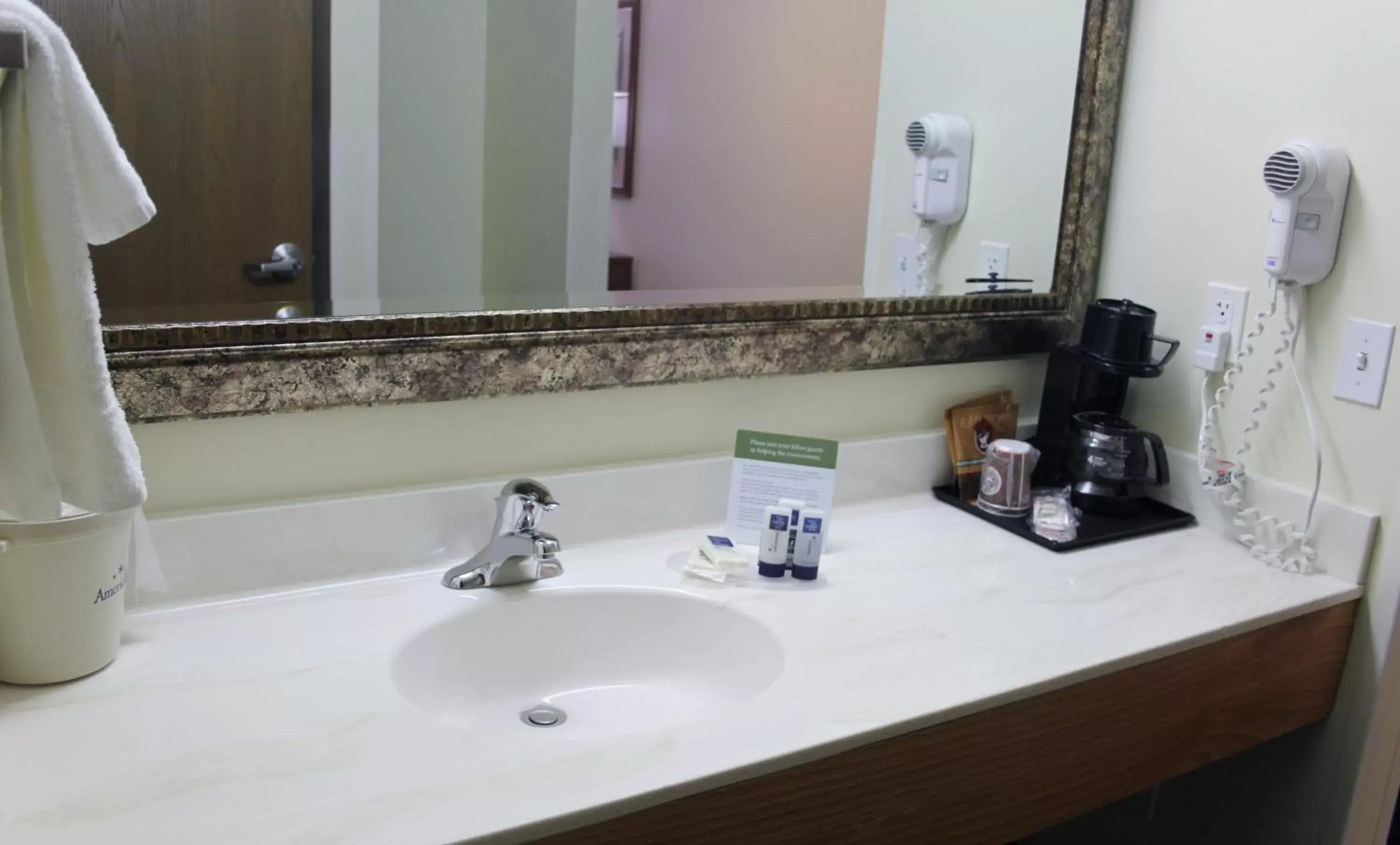 Bathroom in AmericInn by Wyndham Cedar Rapids Airport
