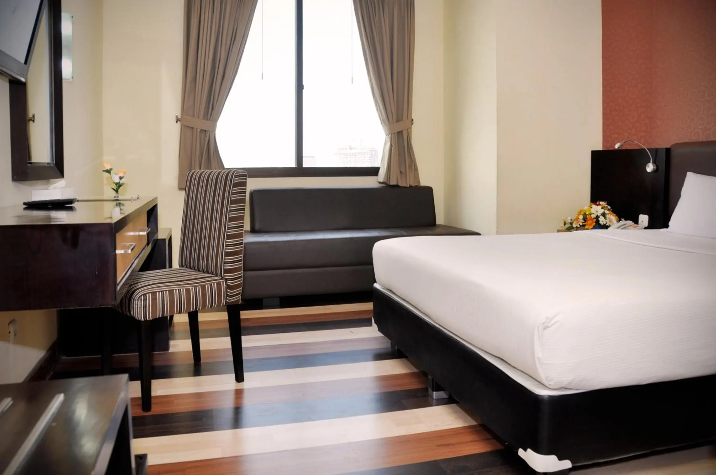 Bed in Pandanaran Hotel