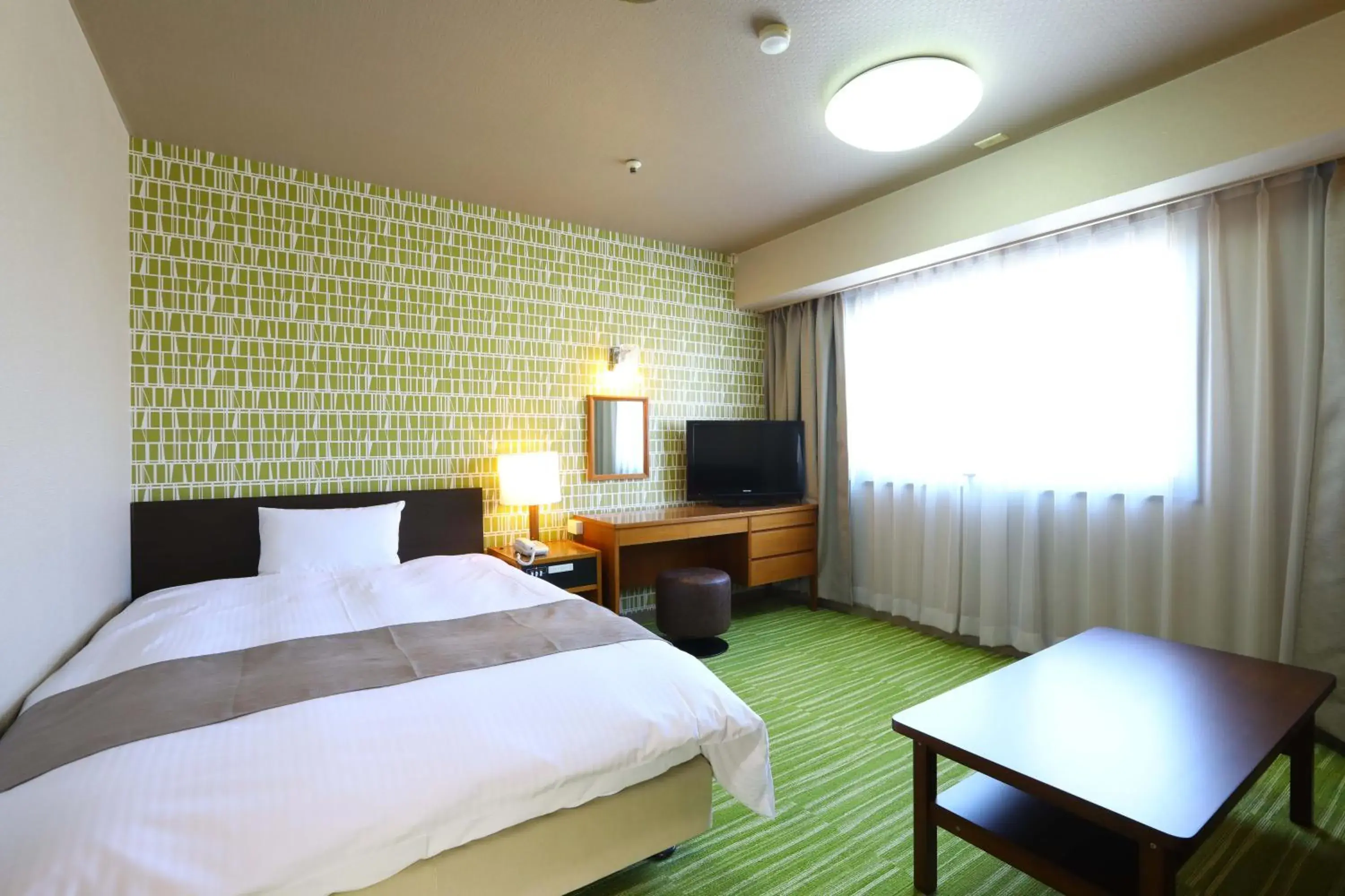 Bedroom, Bed in Hachinohe Grand Hotel