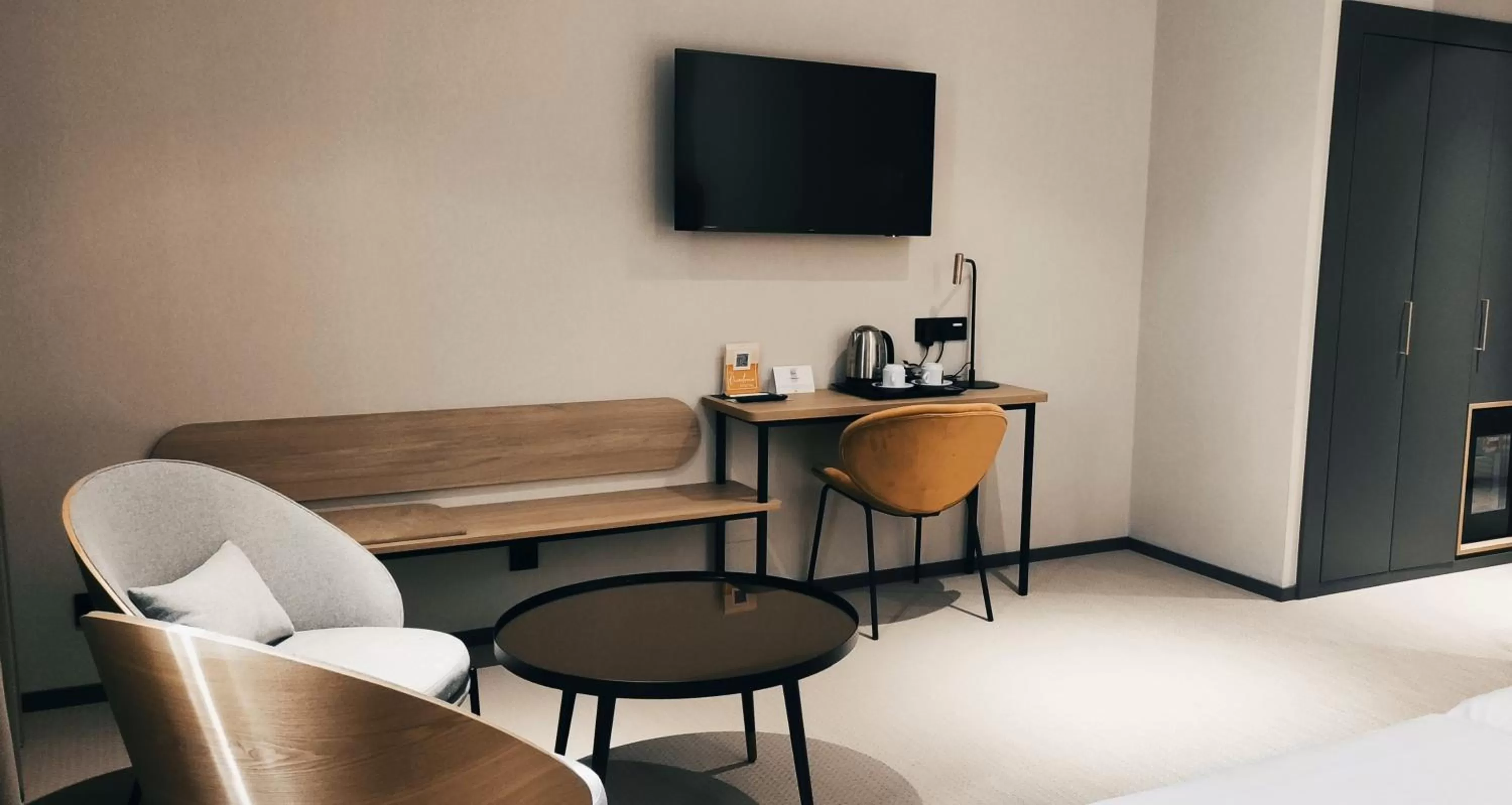 Seating area, Bed in Silken Ciudad Gijón