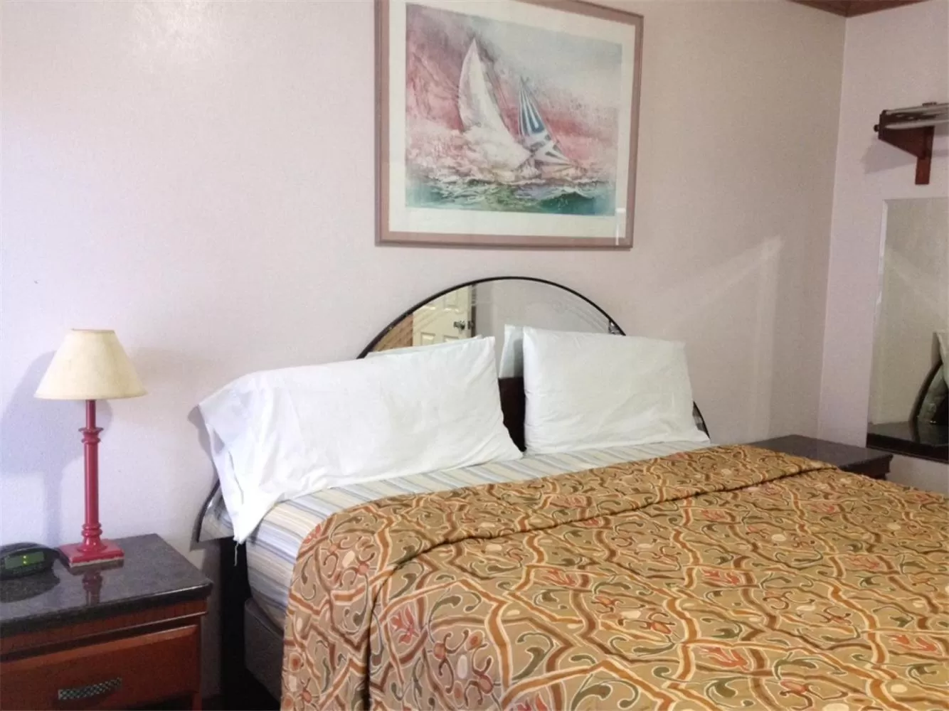 Bed in Walls Motel Long Beach