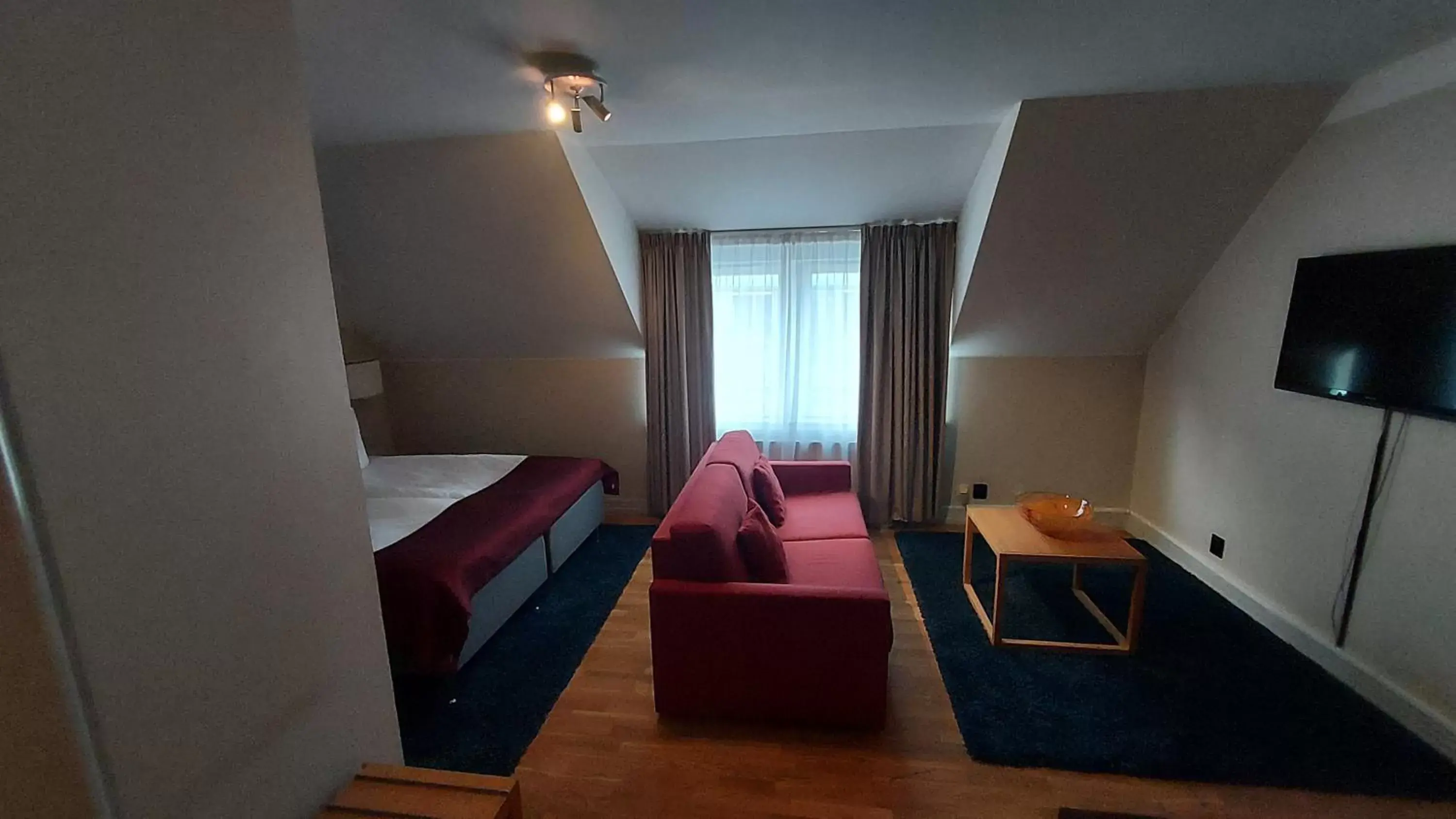 Bed, TV/Entertainment Center in ProfilHotels Riddargatan