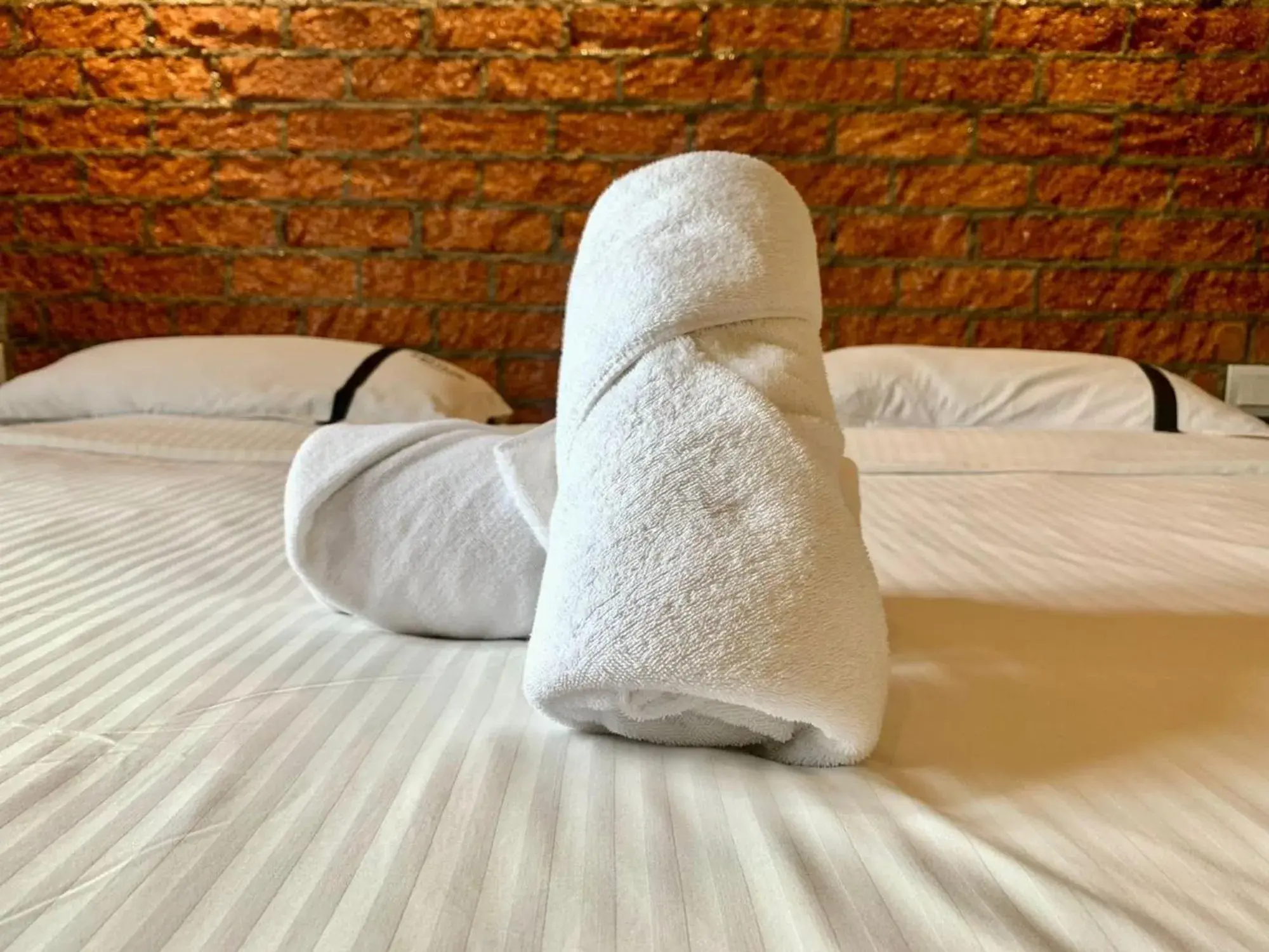 towels, Bed in Smile Hotel Subang USJ